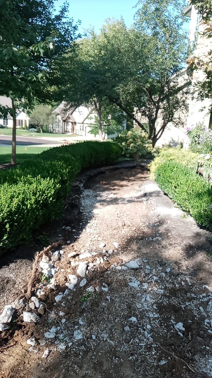 New Driveway and Sidewalk by LAND ESCAPES LLC