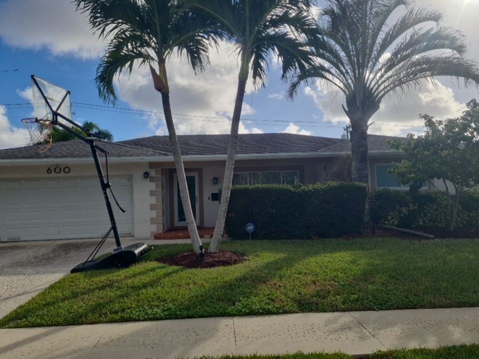Residential Roofing Installation using 1" Nail strip metal roof by BLUES BROTHERS CONSTRUCTION CORP