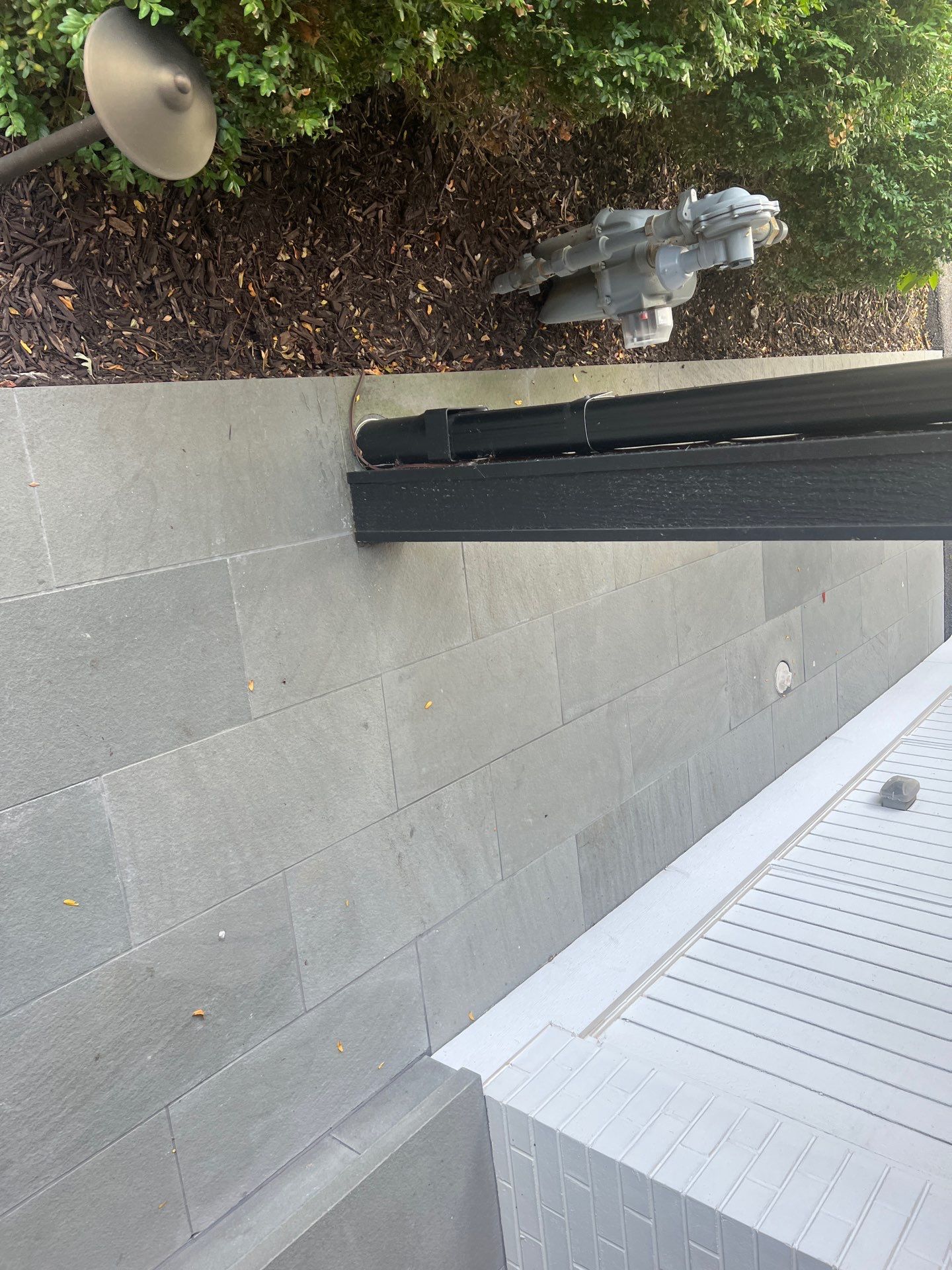 Complete Exterior House, Bluestone & Garage Floor Cleaning by Northern Power Washing LLC.