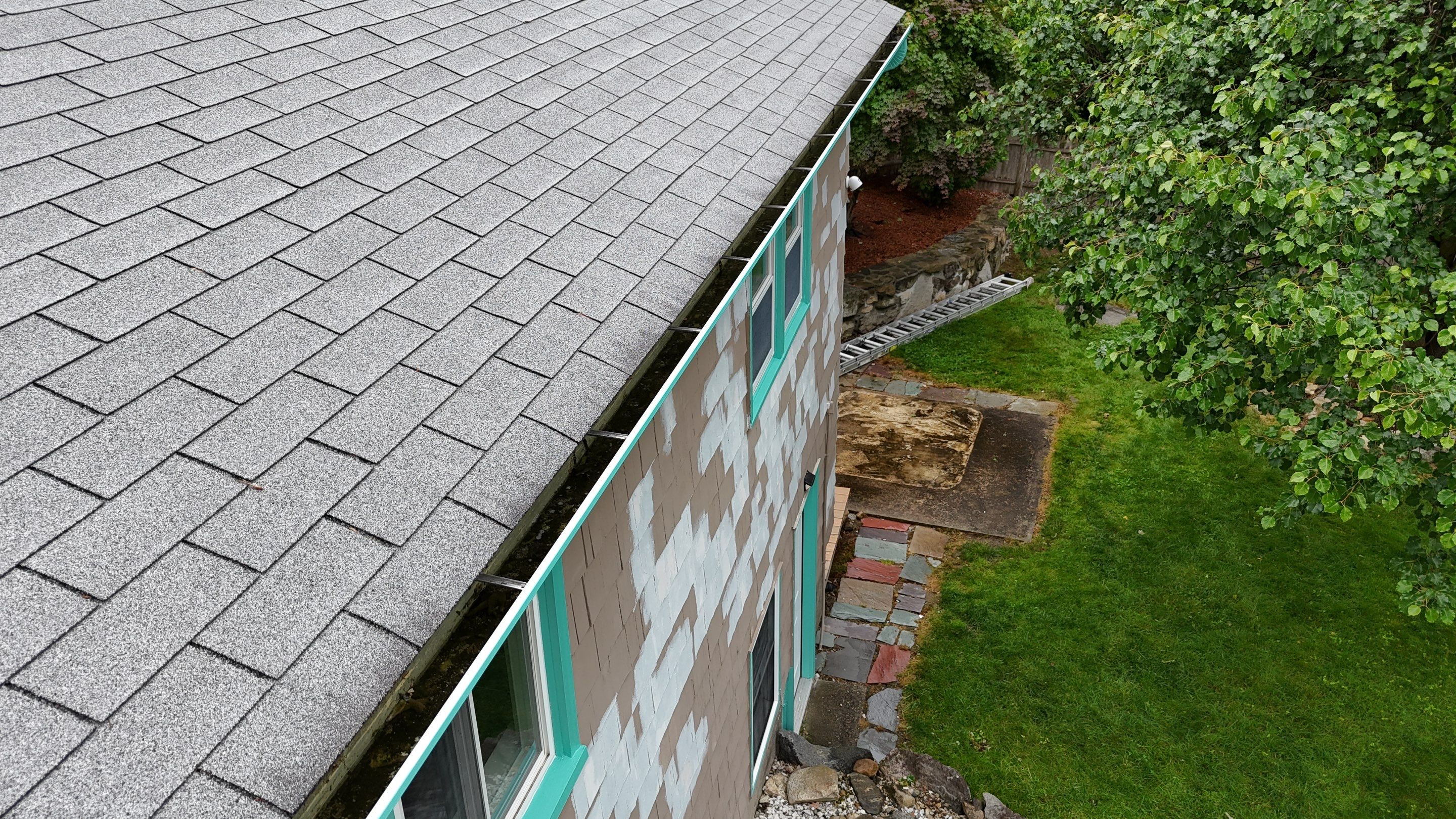 Roof Replacement with Gutter Guards – Westford, MA by Mighty Dog Roofing of Greater Middlesex County