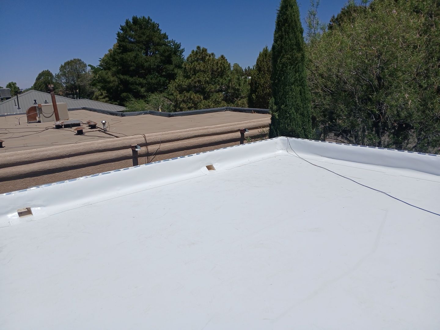 Residential TPO Roof Replacement and Decking Repair in Albuquerque by Doyle Roof Masters Inc