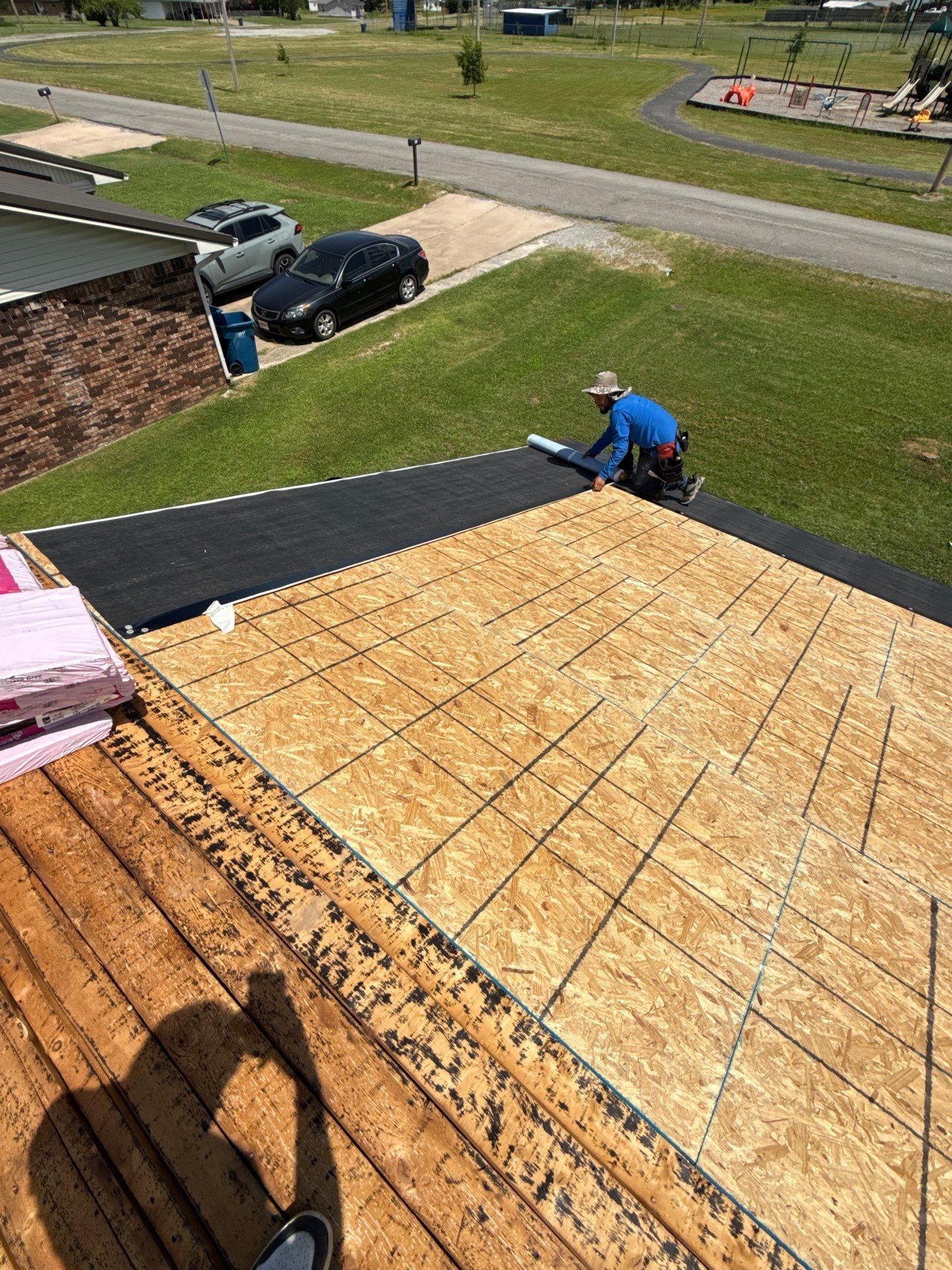 New roof & siding paid by insurance. Along with new roof sheathing.  by In & Out Construction & Remodeling, LLC