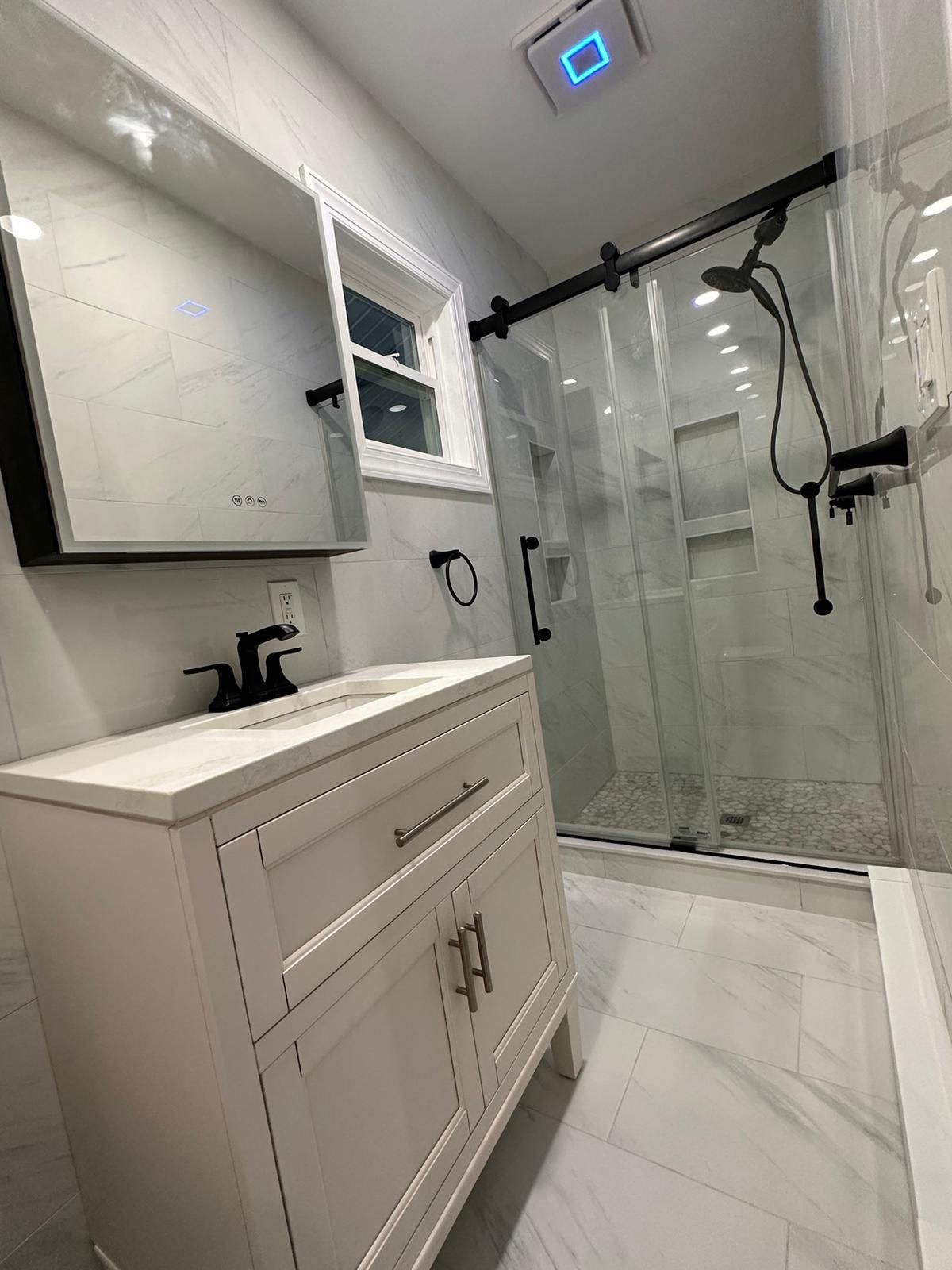 Bathroom Remodel using Tile by Home Concepts Construction