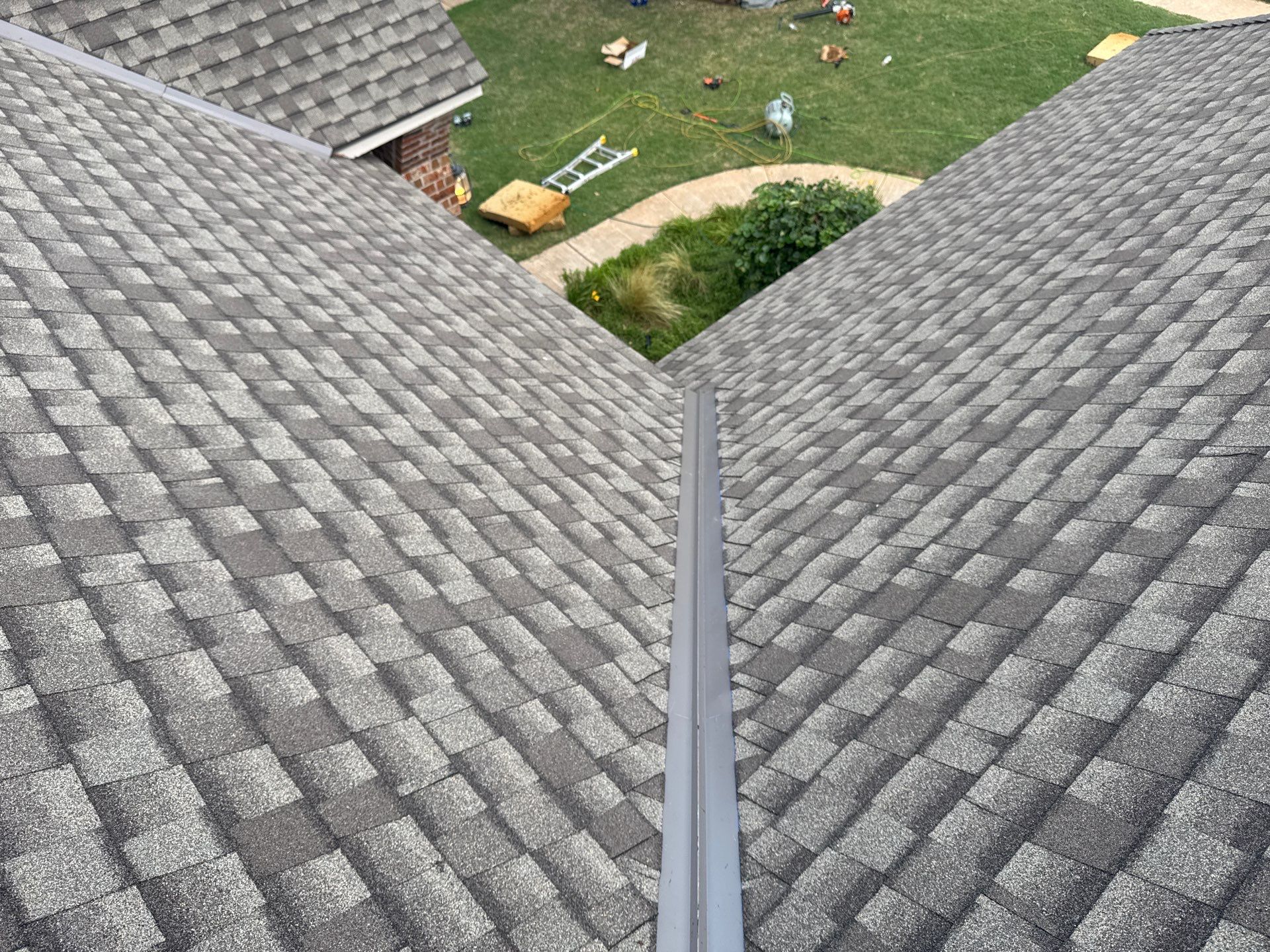 GAF Architectural Shingle Roof Replacement and Decking Repair in Mustang by 5Coat Roofing & Construction
