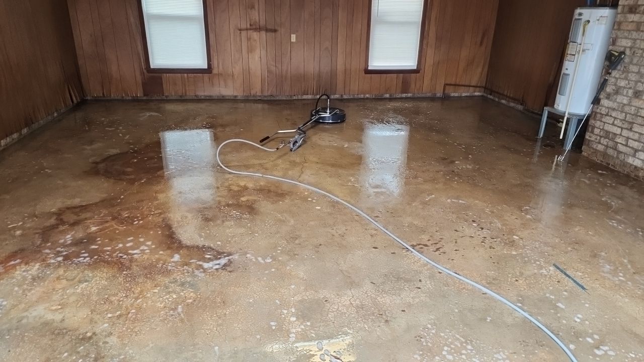 garage floor clean using cleaner by G&H Home Tech Pros LLC