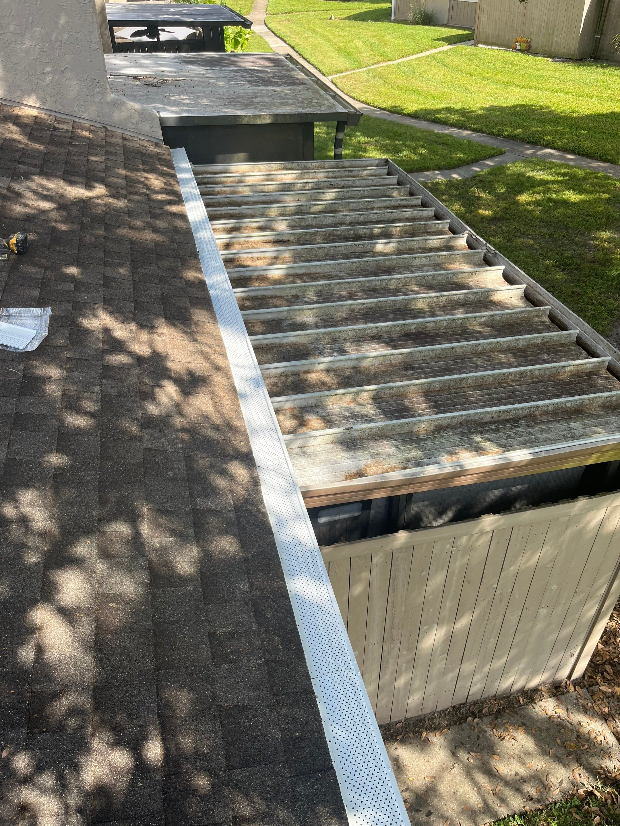 Professional Downspout Installation in Tampa, FL by Gutter Professor by Gutter Professors