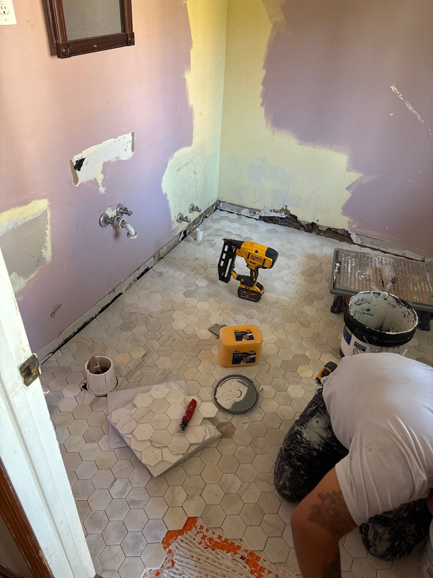 Custom Bathroom Remodel and Marble Tile Installation in Bellevue by Footprints Floors Kentucky