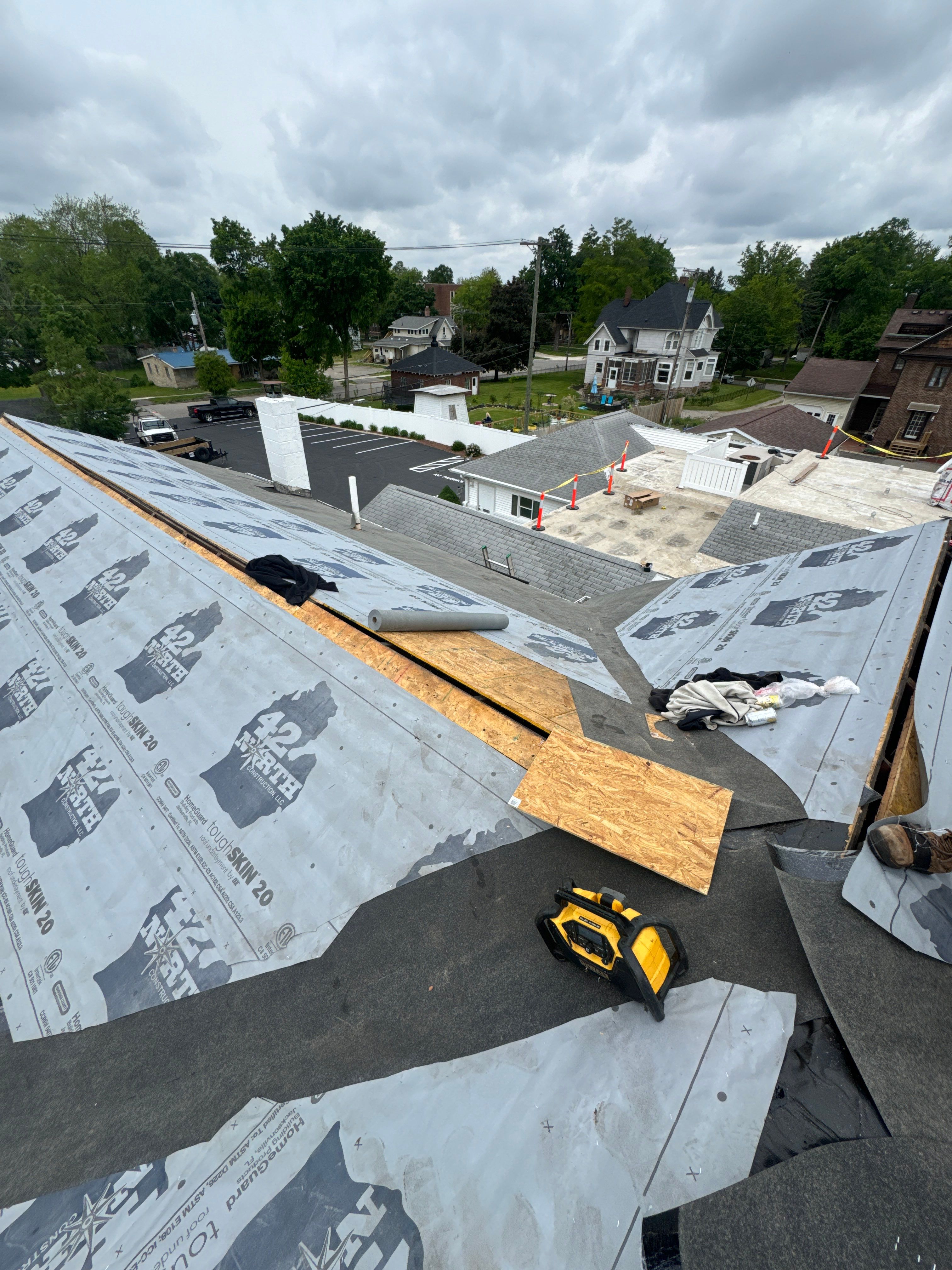 Commercial Flat and Shingled Roof Project by 42 North Construction, LLC.