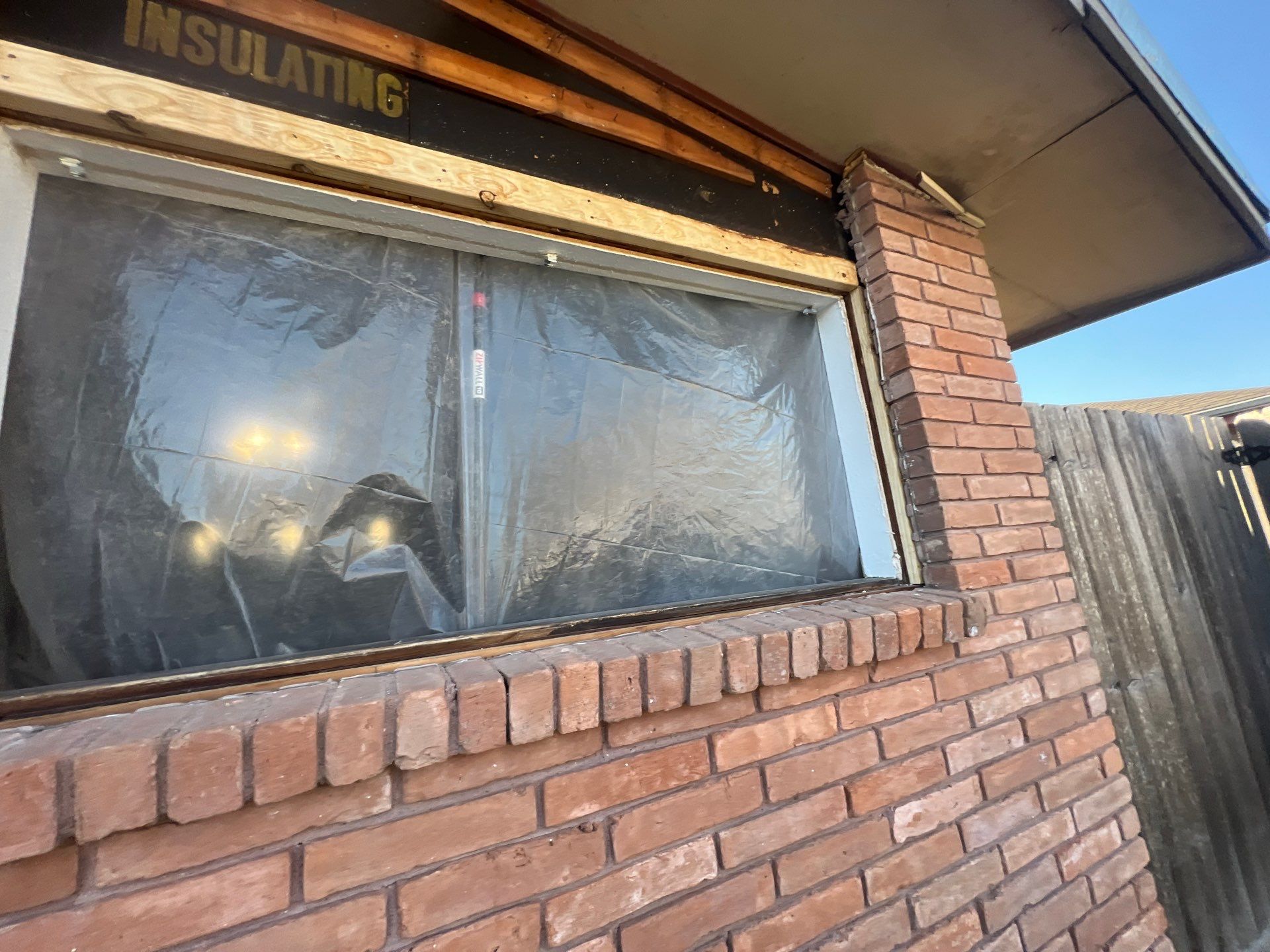 Windows in Brick with a Bay Window by Bayfront Roofing and Construction
