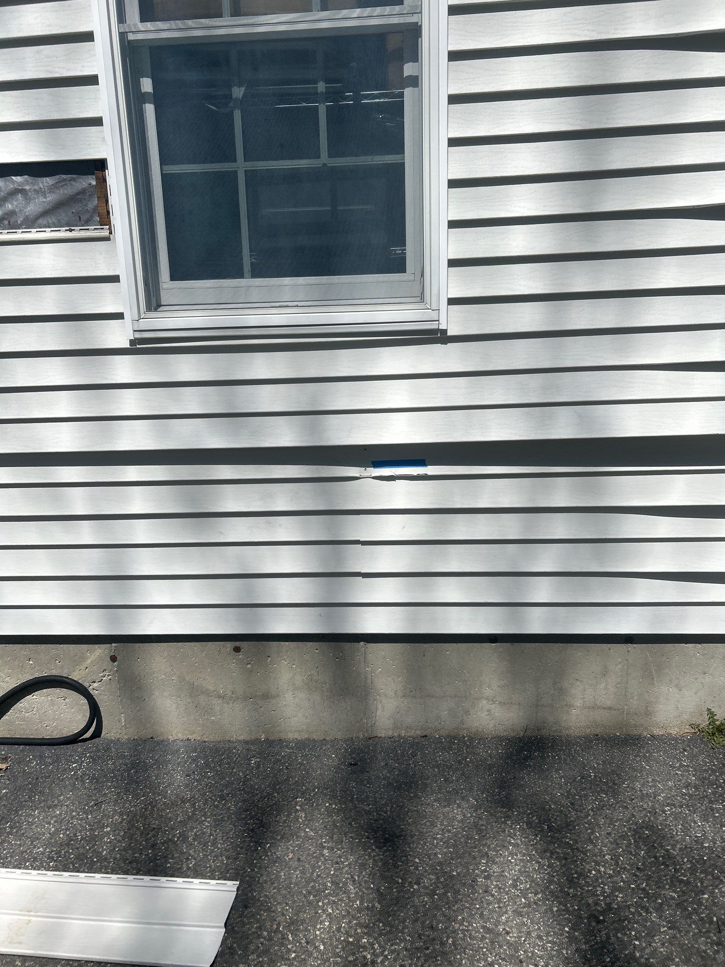 Vinyl Siding Repair with Spot Replacement by Mighty Dog Roofing of Greater Middlesex County