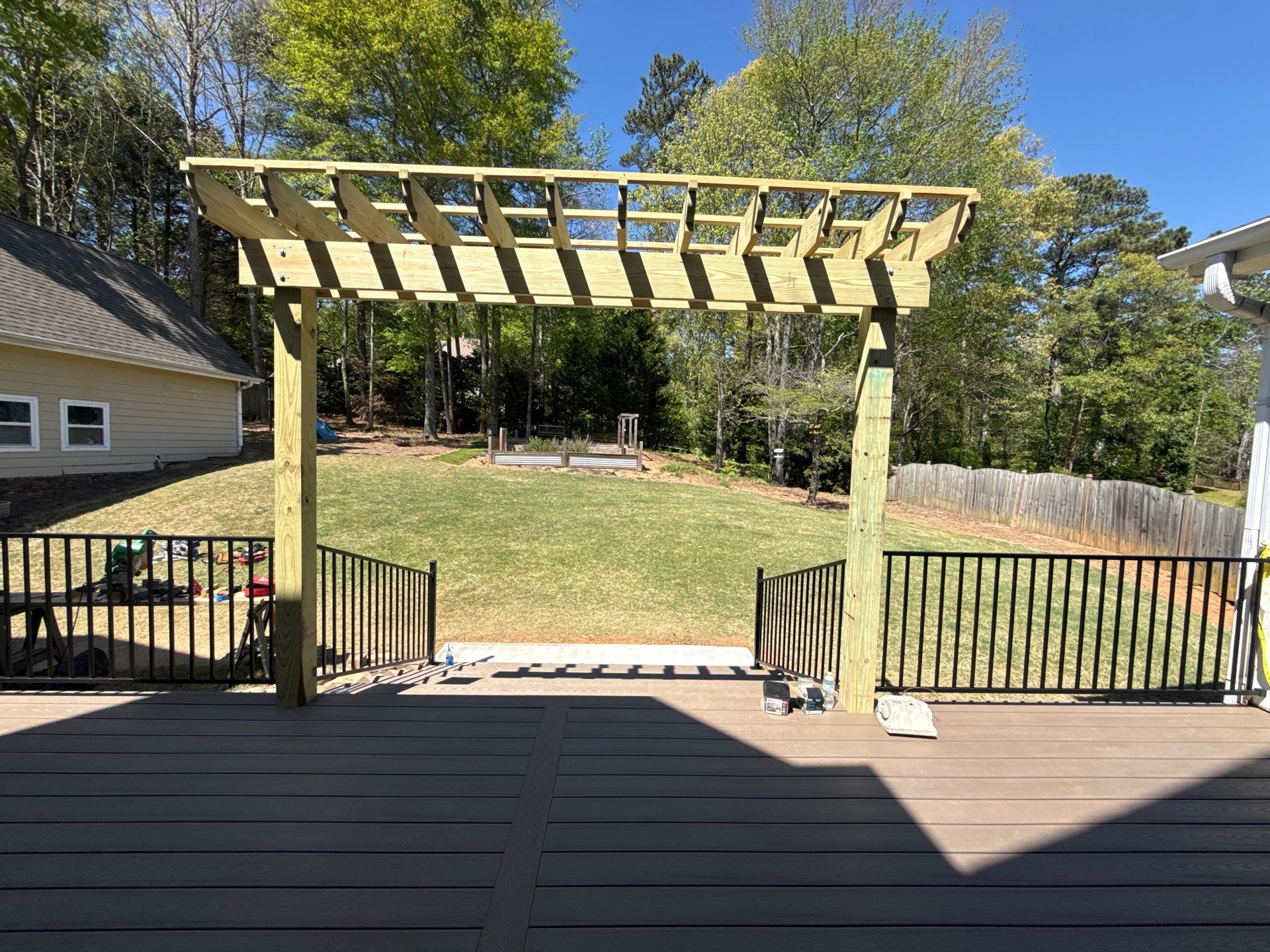 Marietta, GA Deck Replacement using Deckorators Venture Series Decking and Trex Steel Railing by Nelson Exteriors 