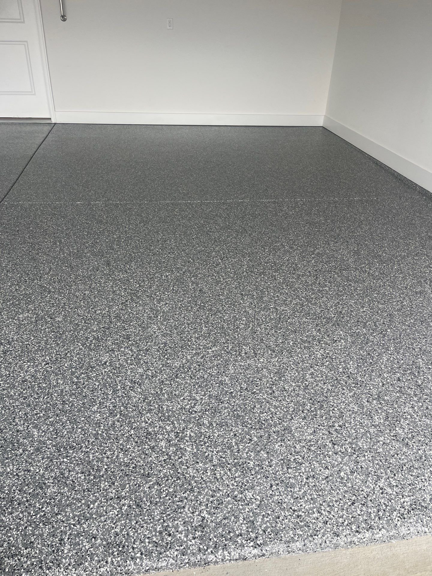 Garage Floor Coating using Wombat by My Garage Floor Guys
