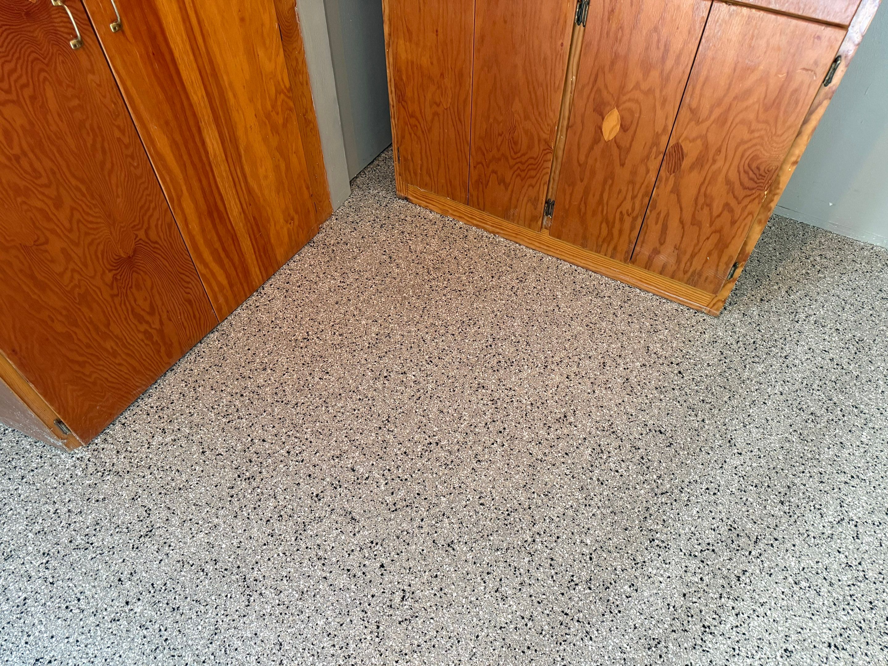 Cabin Fever Concrete Coating for Sioux Falls Garage by Select Painting, Coatings & Garage Cabinets
