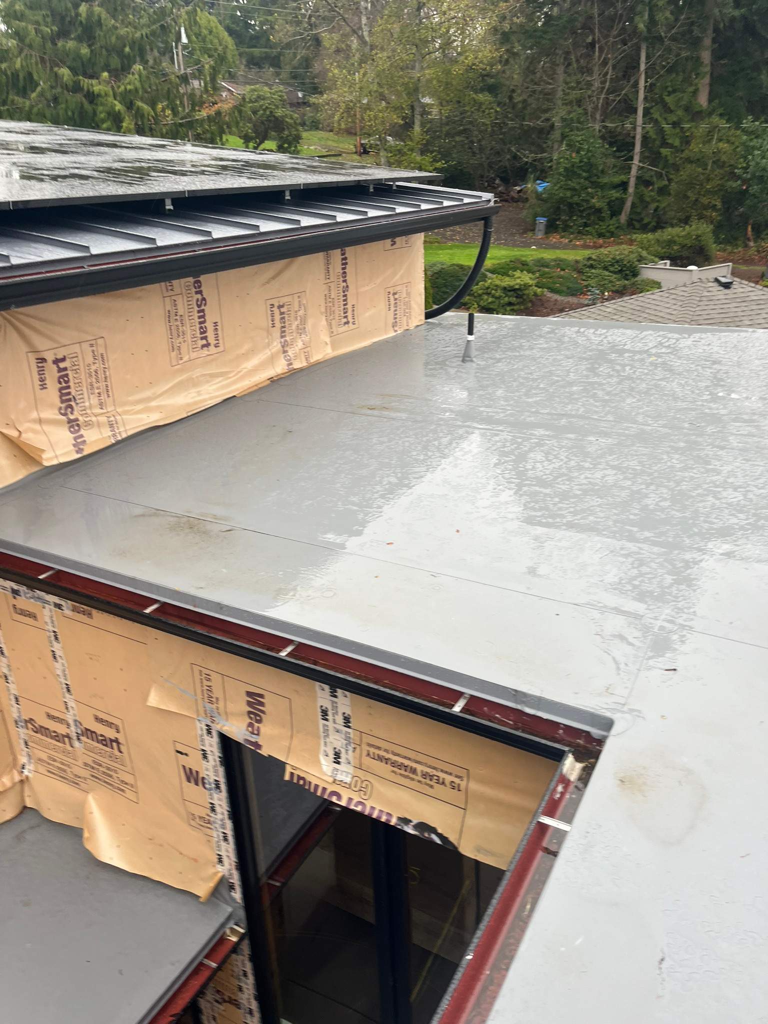 New Construction Roof Installation in Indianola, WA by Hanley Construction