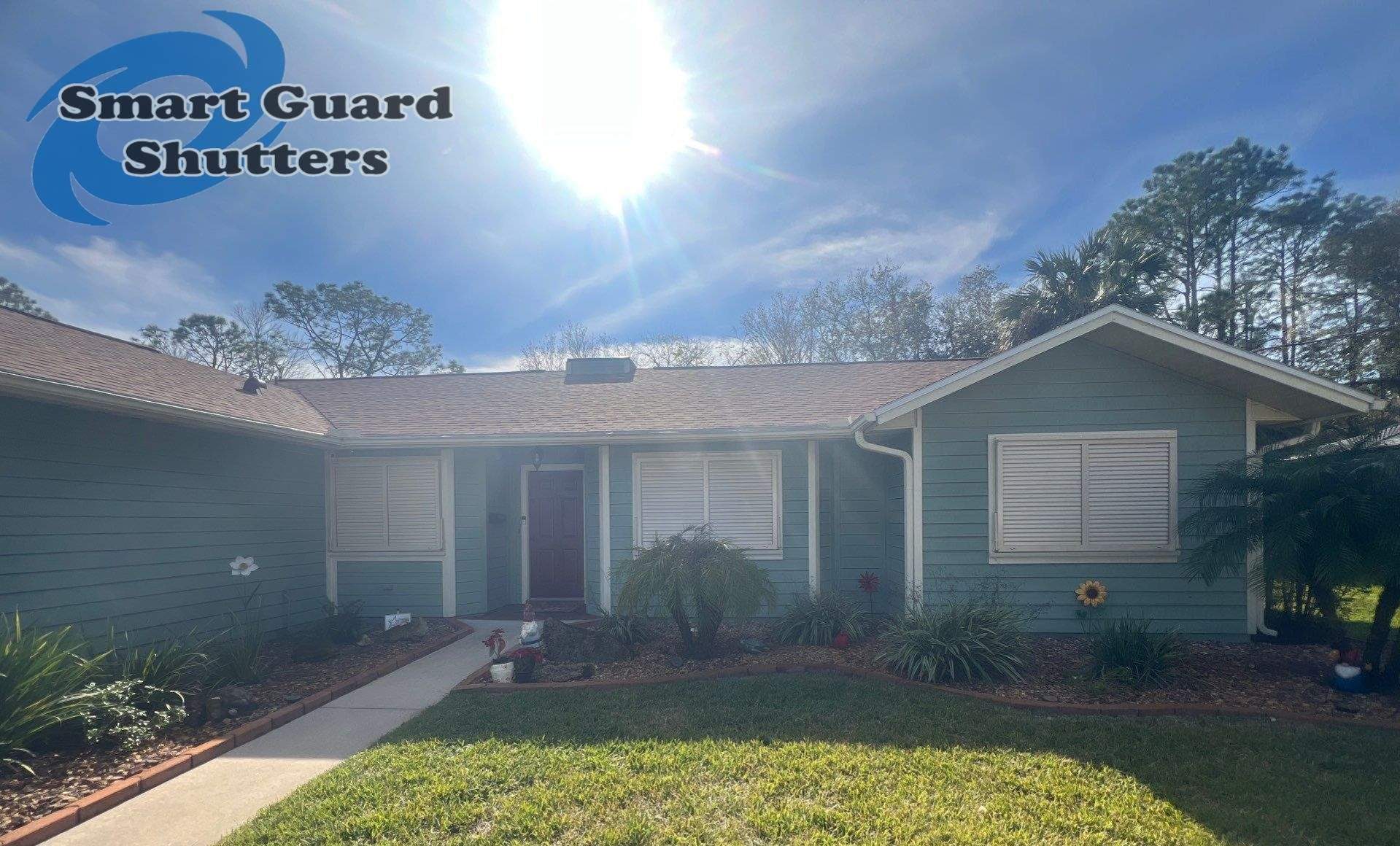 Impact Bahama Shutters in Light Ivory by Smart Guard Shutters