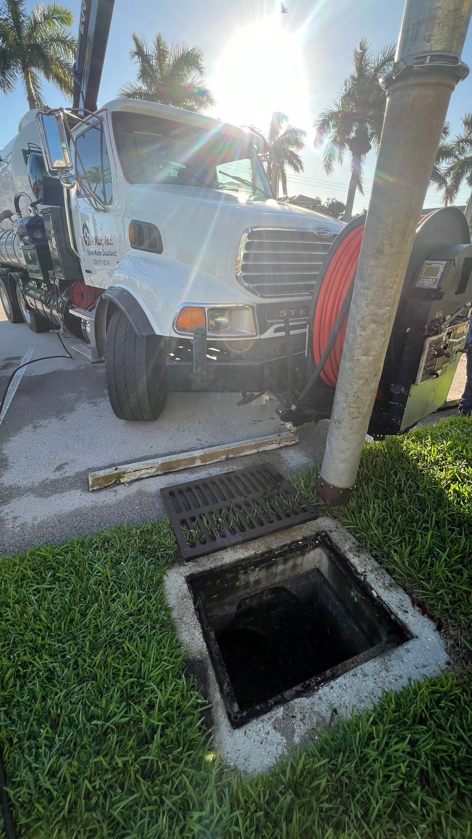 Stromwater System Maintenance at Bill Smith Appliances / Critter Cafe Marco Island Catch Basin by Don Mar, Inc. Storm Water Solutions