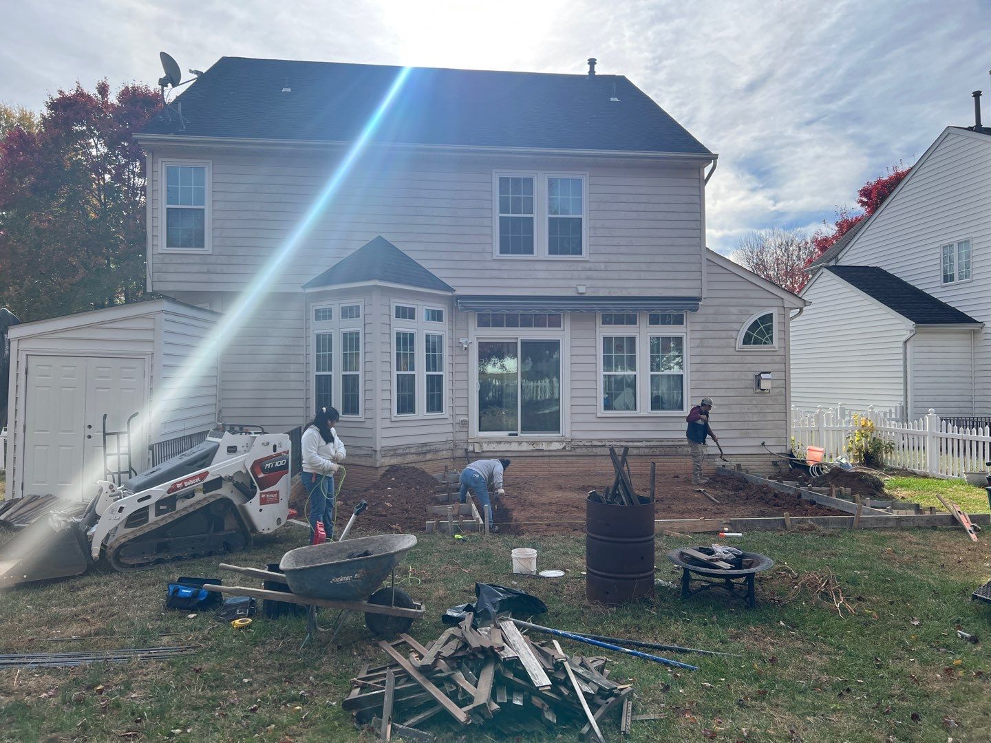 Custom Screened-In Porch with Stamped Concrete Patio in Warrenton by Jakari Restoration & Construction LLC