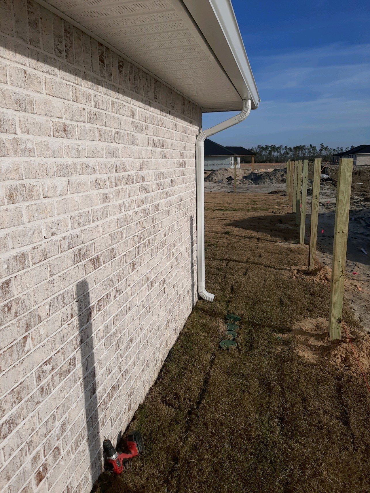 Seamless Gutter Installation Using White K-Style Gutters by Gutter Professors