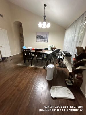 Dining Room Remodel Featuring Dark Wood Laminate Flooring in Chandler