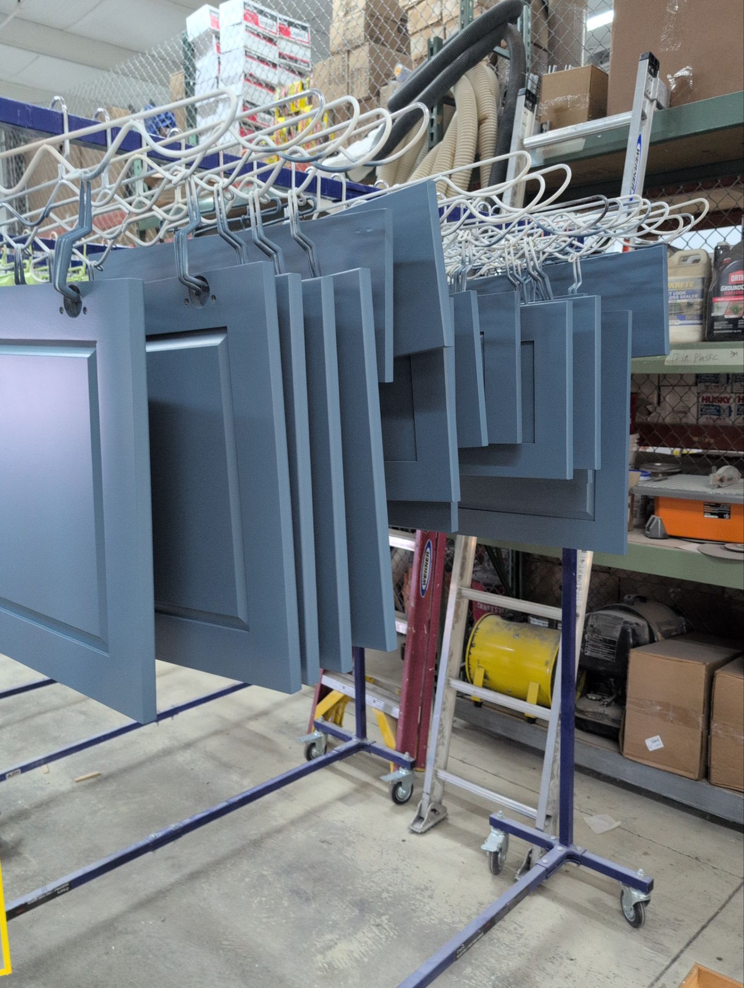 Blue-Grey Kitchen Cabinet Refinishing Transformation in White Lake by Top Shelf Painter