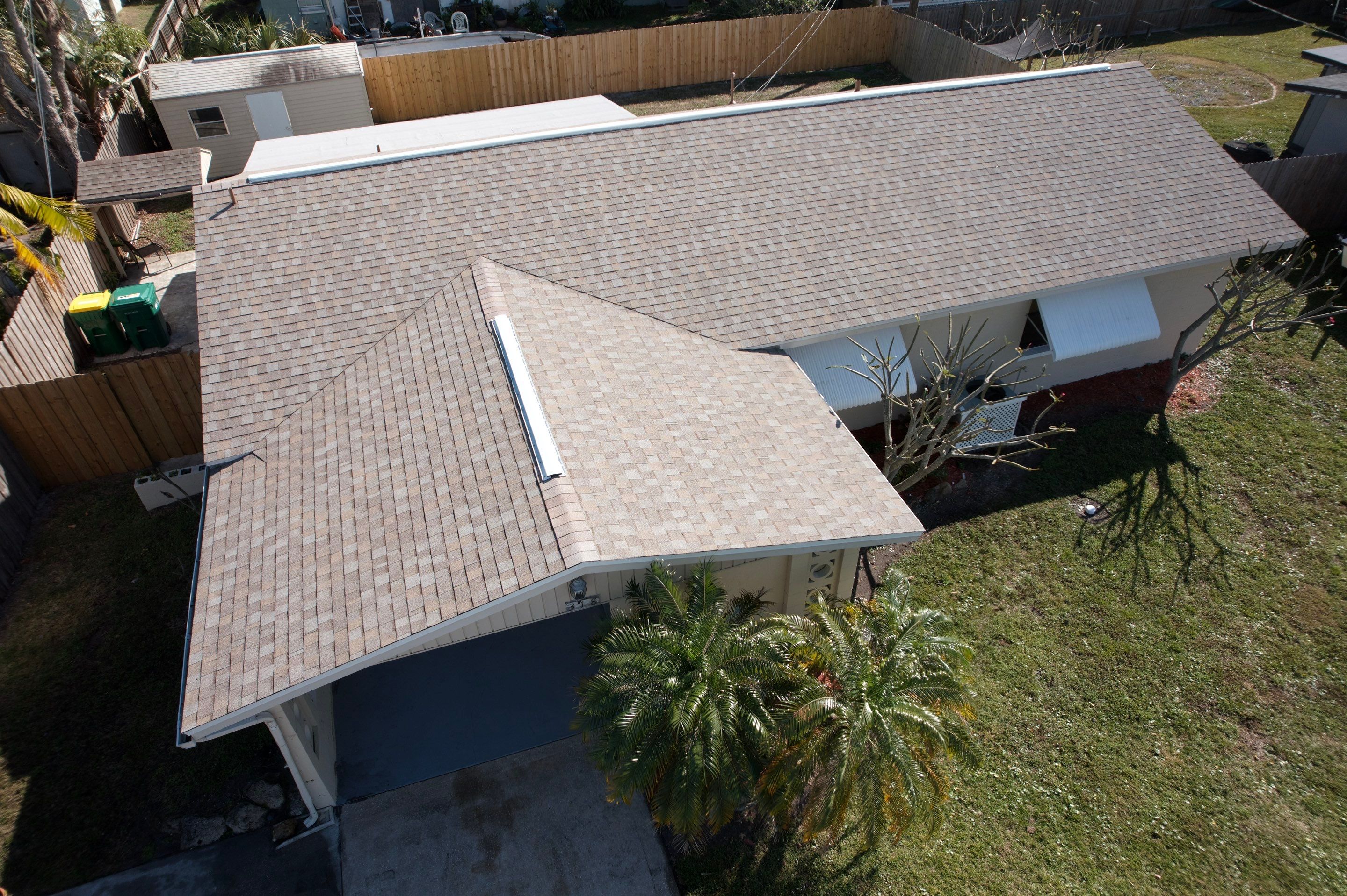 Complete Asphalt Shingle and Flat Roof Replacement in Merritt Island by Wiedmann Construction & Roofing