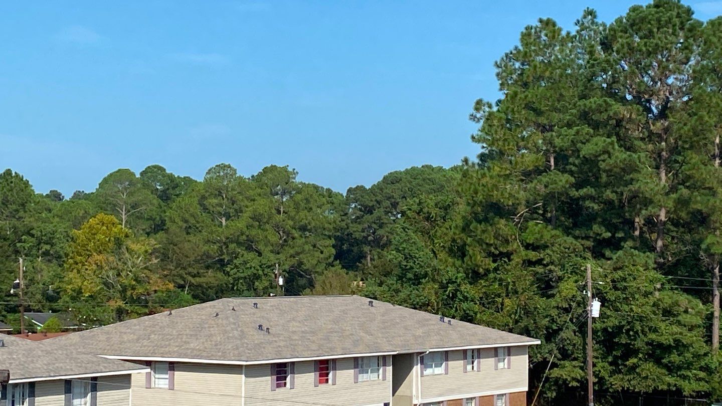 Commercial Roofing Installation using Roof Replacement by American Roofing & Construction LLC