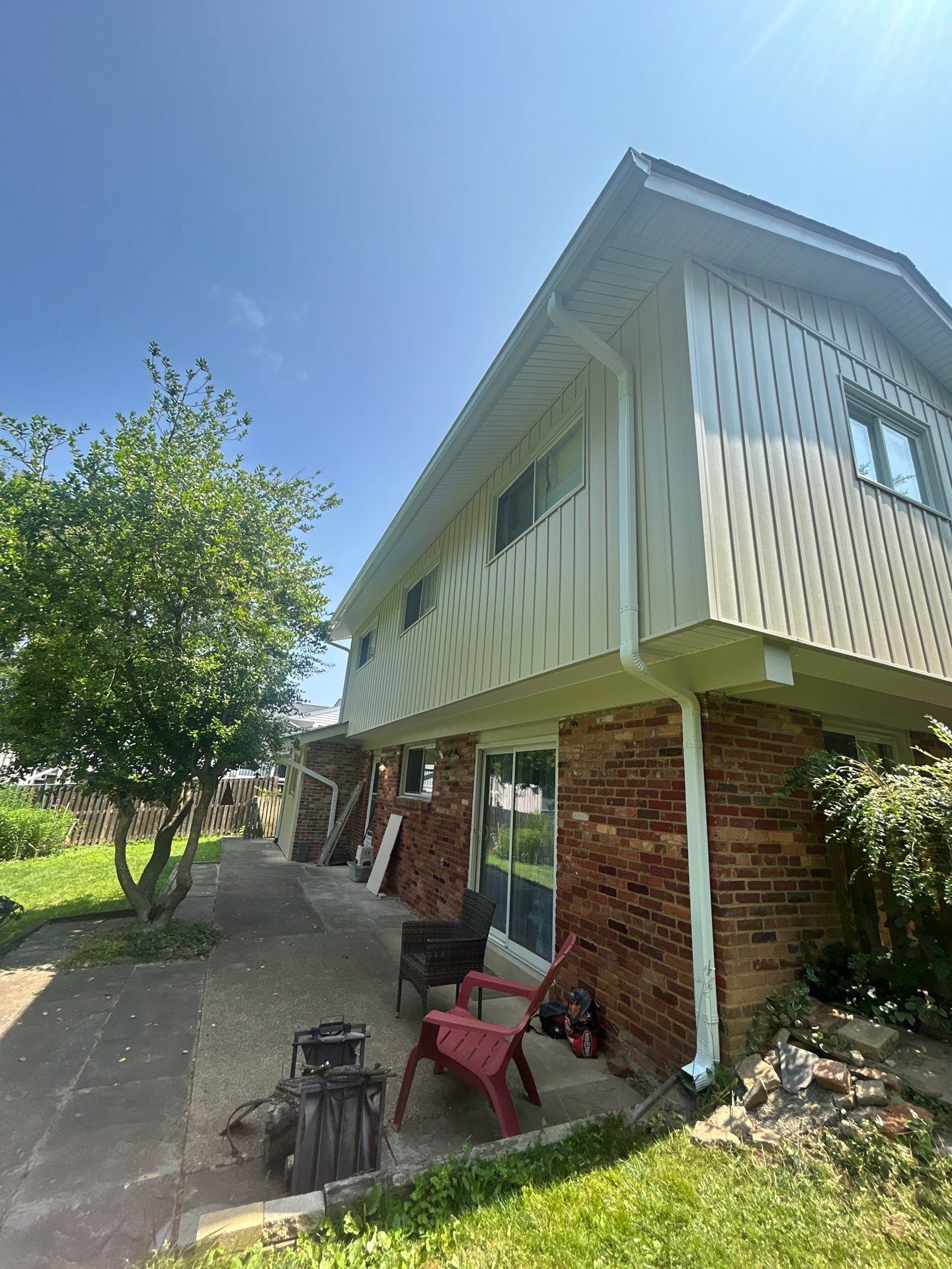 Fairfax: Residential Siding Replacement with CertainTeed 8" Board and Batten Siding in Desert Tan by RM Banning, Inc.