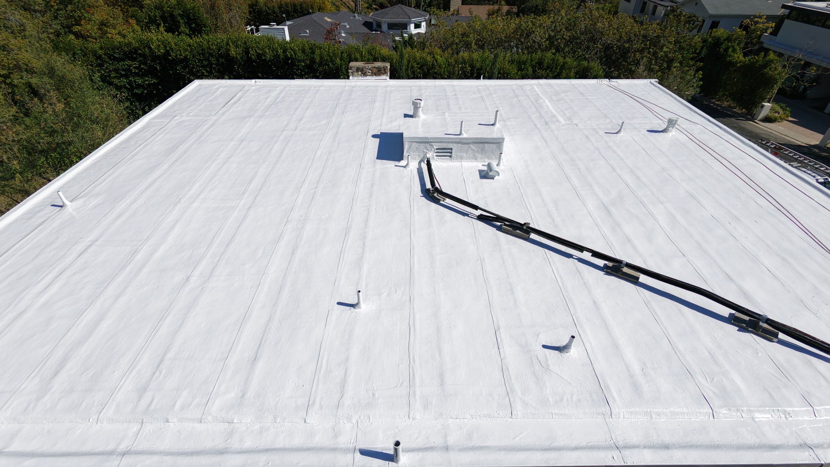 Flat Roof Reflective Coating and Repairs in Brentwood by Hull Brothers Roofing