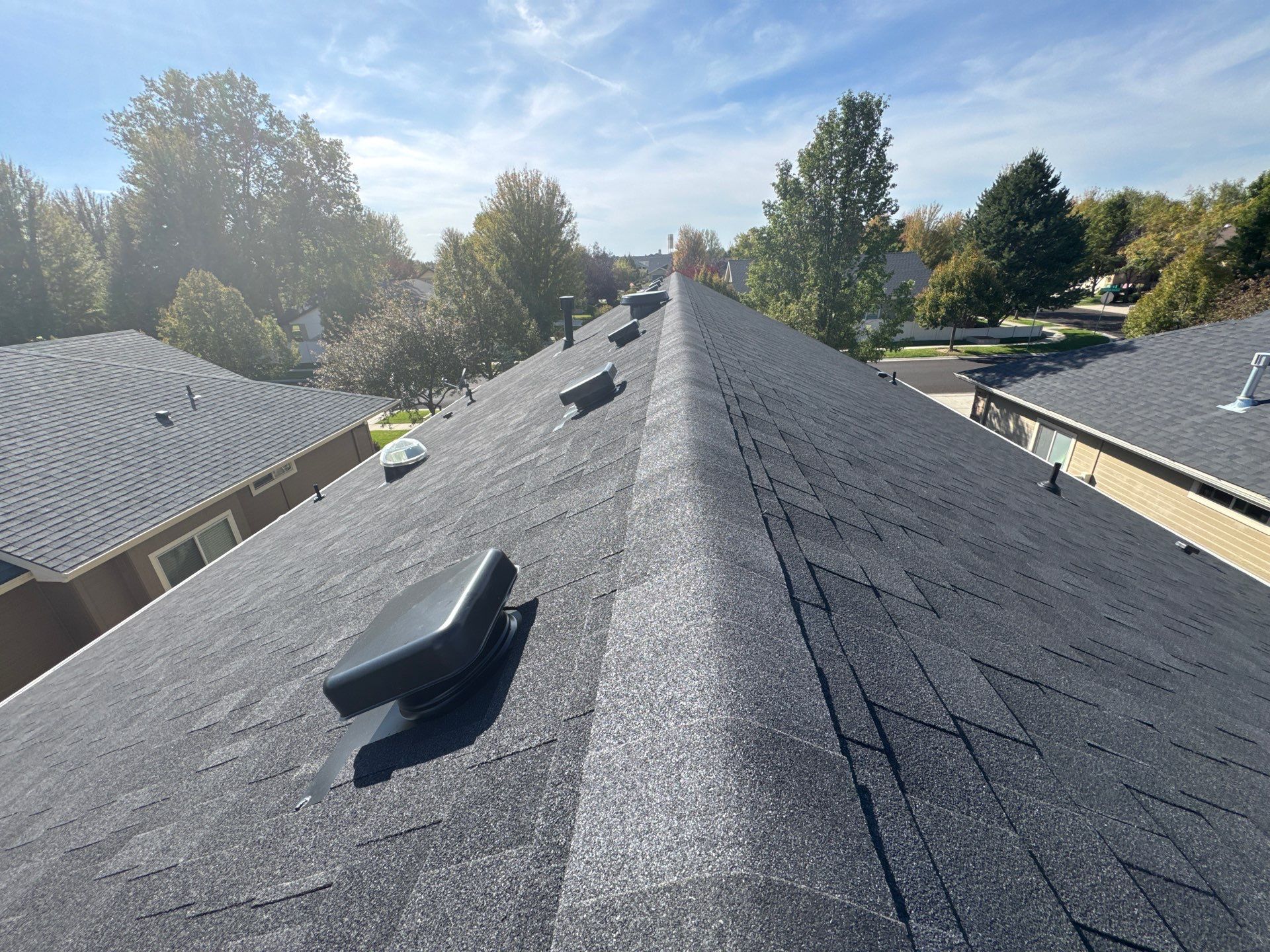 Residential Roof Replacement With Charcoal Architectural Shingles in Meridian