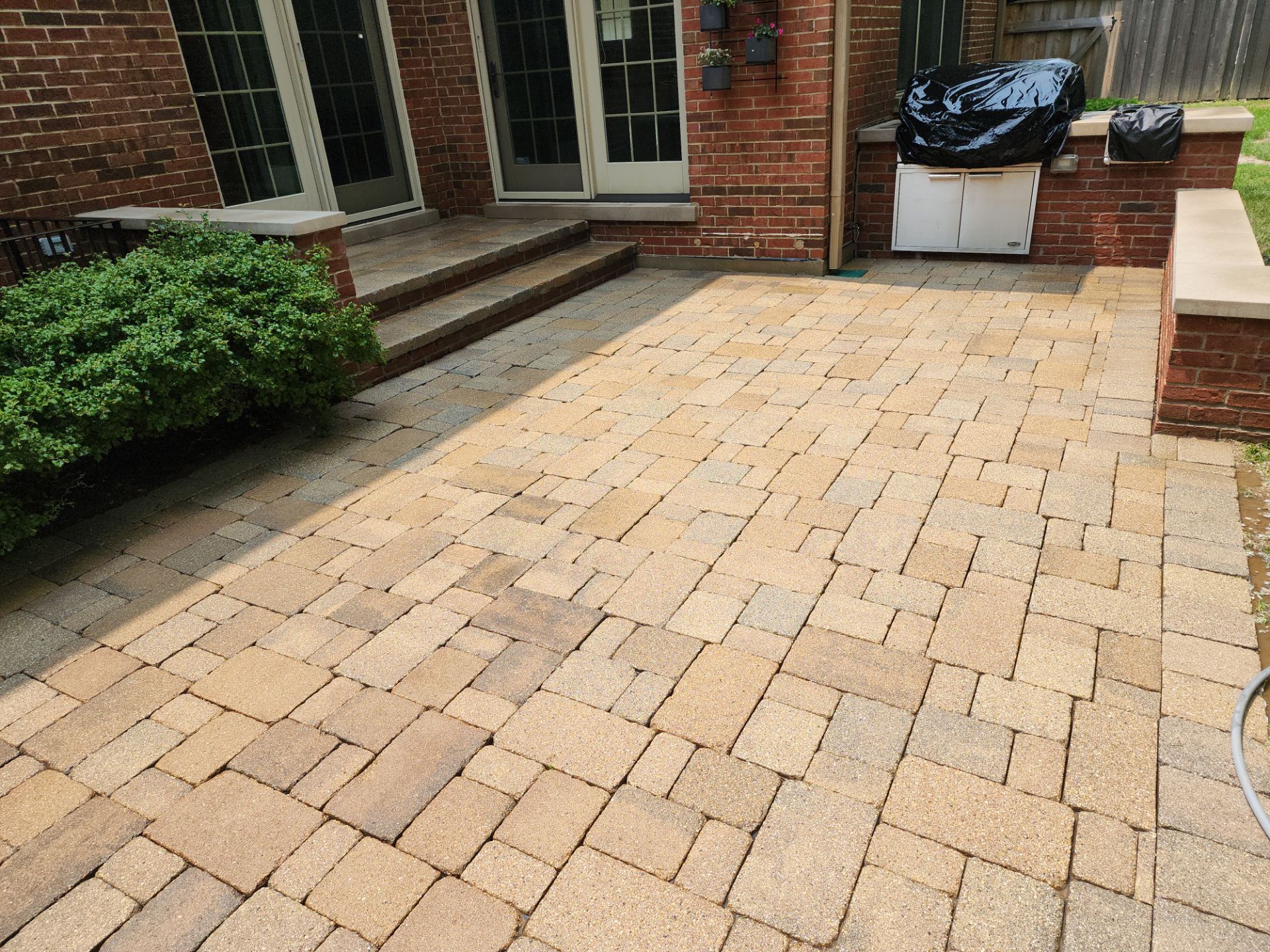 Brick paver repair, clean, seal and poly sanding by Northern Power Washing LLC.