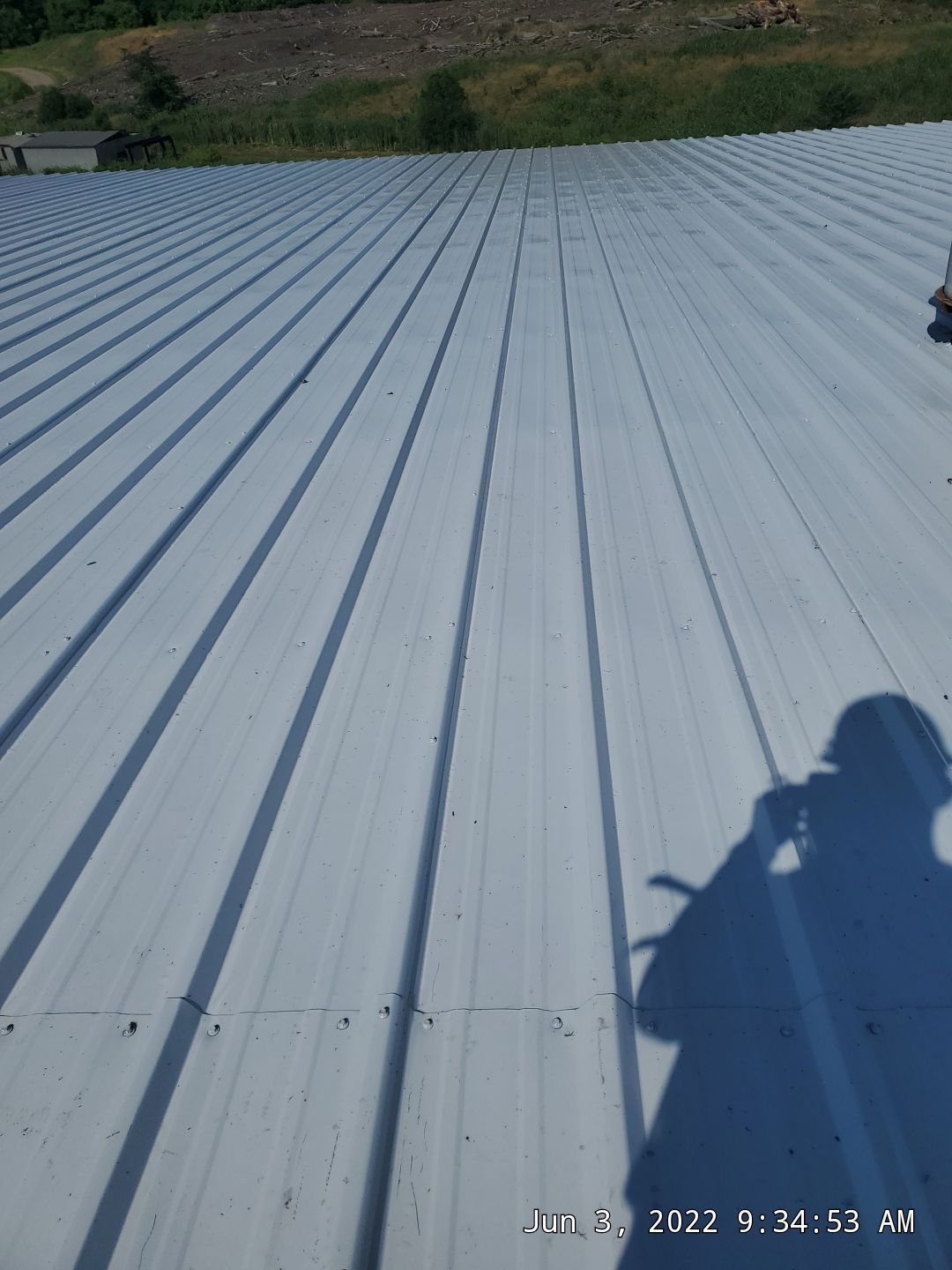 Commercial Roofing Installation using Aluminum Roofing panels by Hostetler Roofing