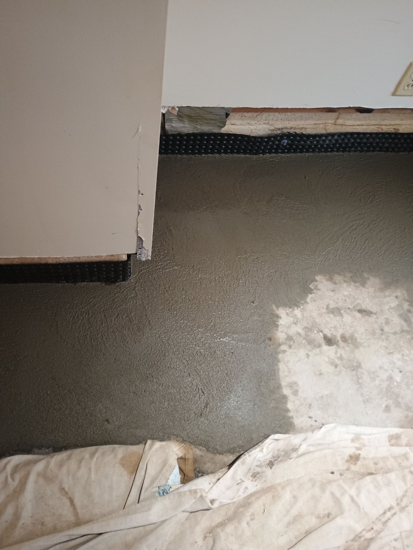 Completing the Connection for Lisa's Drain Tile System by Waterproofing Northeast