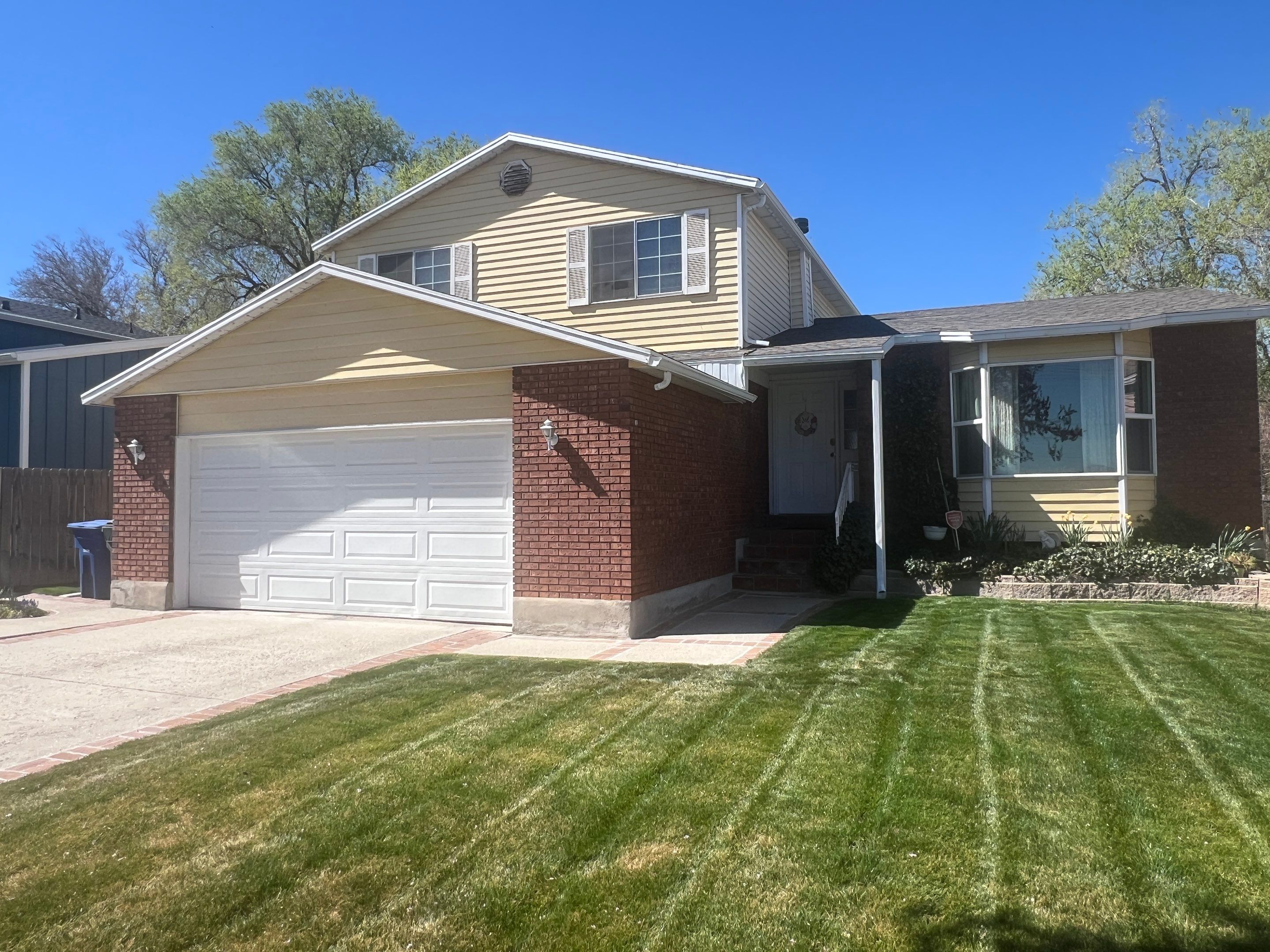 West Valley City | Aluminum to Hardie Conversion | Timber Bark & Arctic White by Ideal Siding Utah