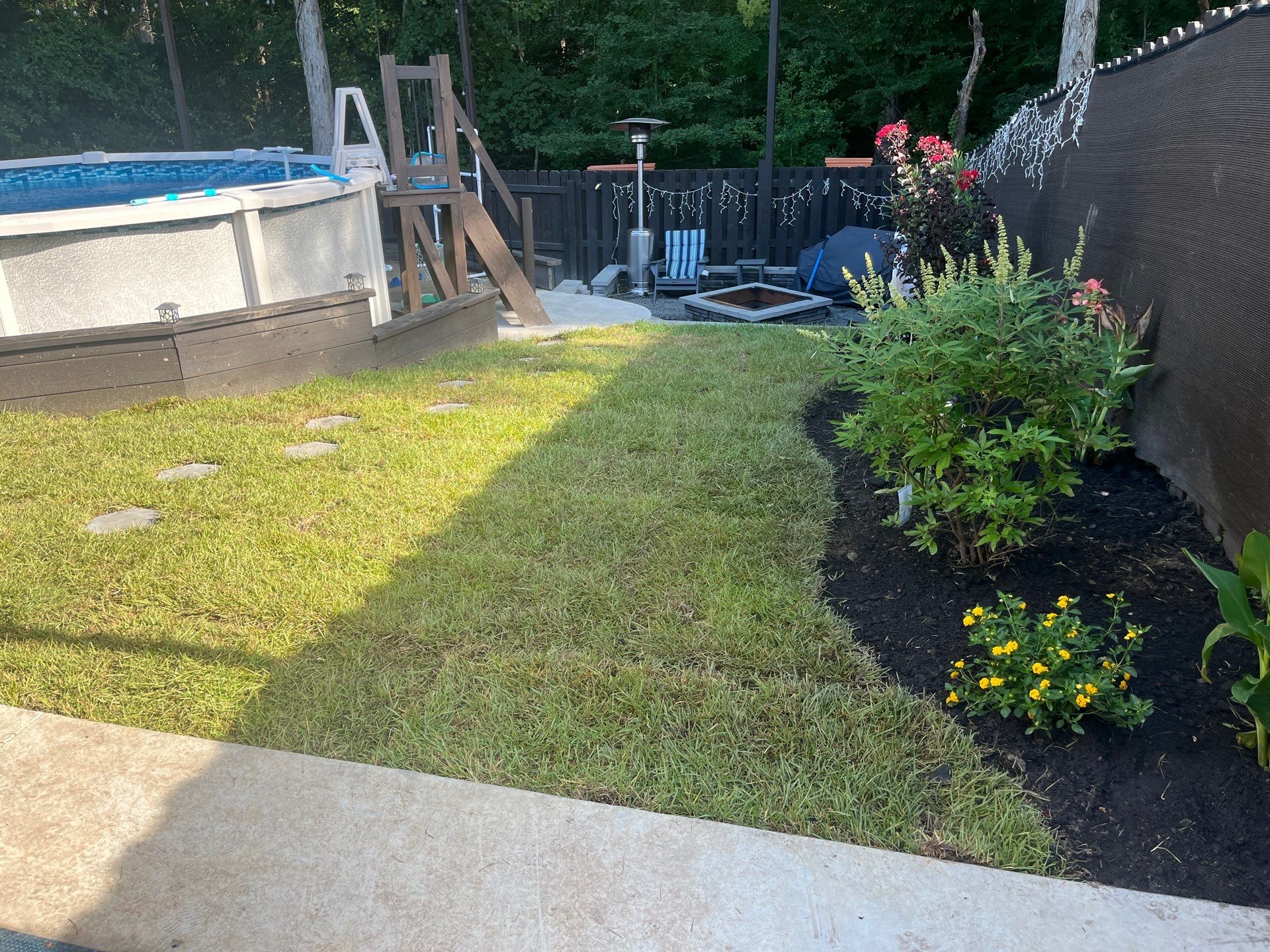 Backyard Sod and Flowerbed Installation in Summerville by Hudson Bros Lawn Care LLC