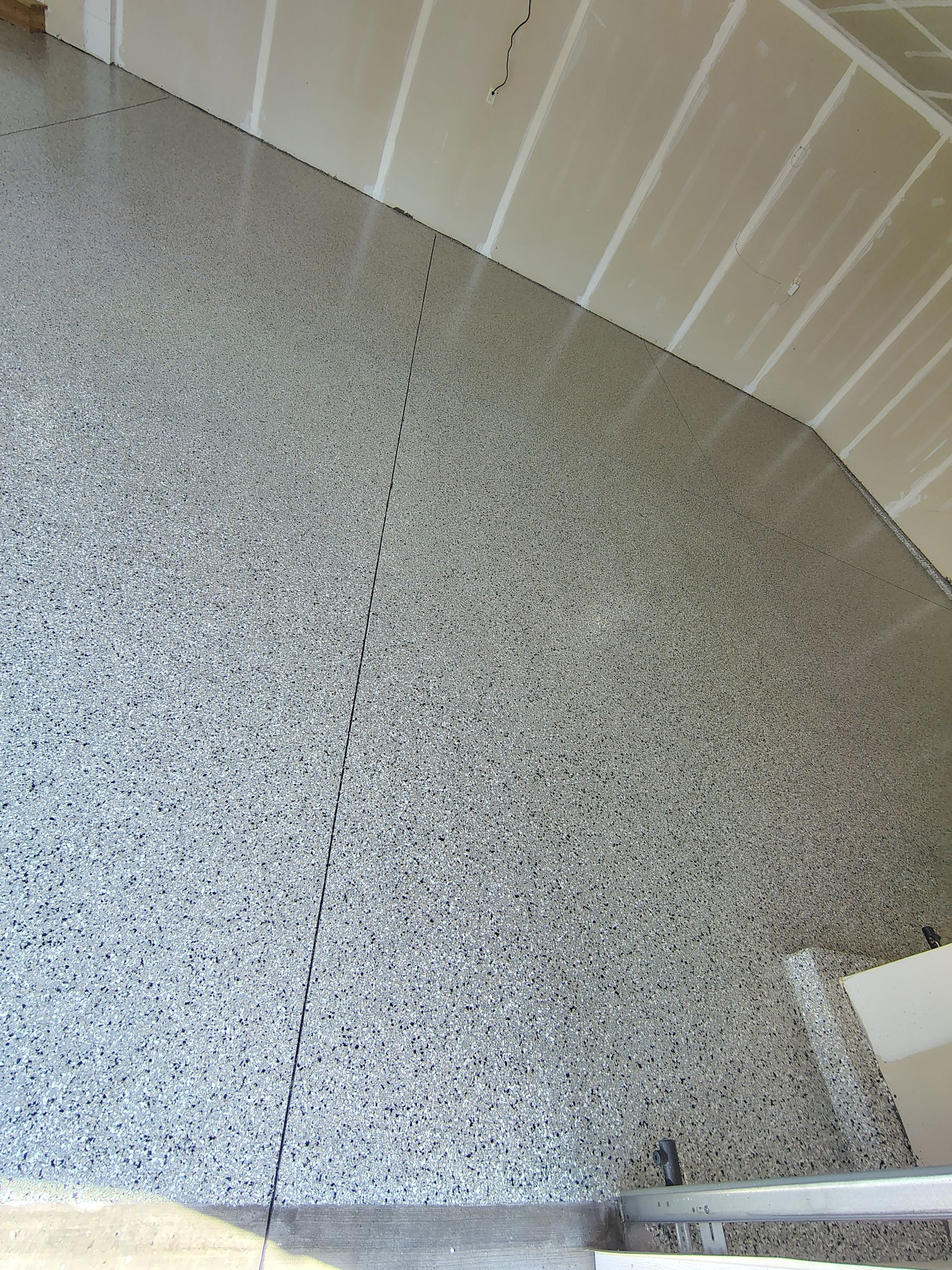 Epoxy Garage Floor Coating with Decorative Flake in Harrisburg by Select Painting, Coatings & Garage Cabinets