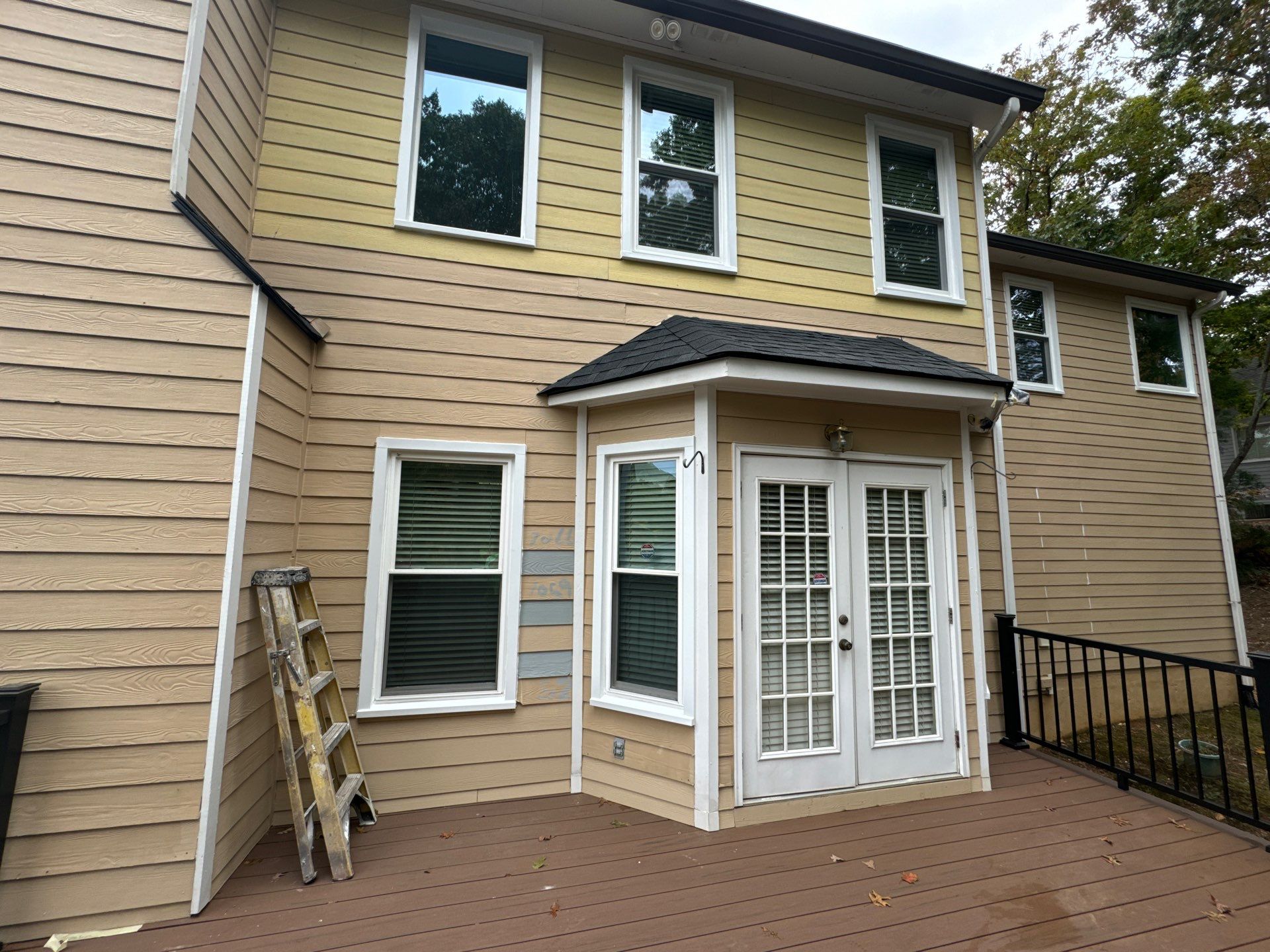 Exterior Painting and Siding Refresh for Woodstock Residential Home by Swift Home Renovations