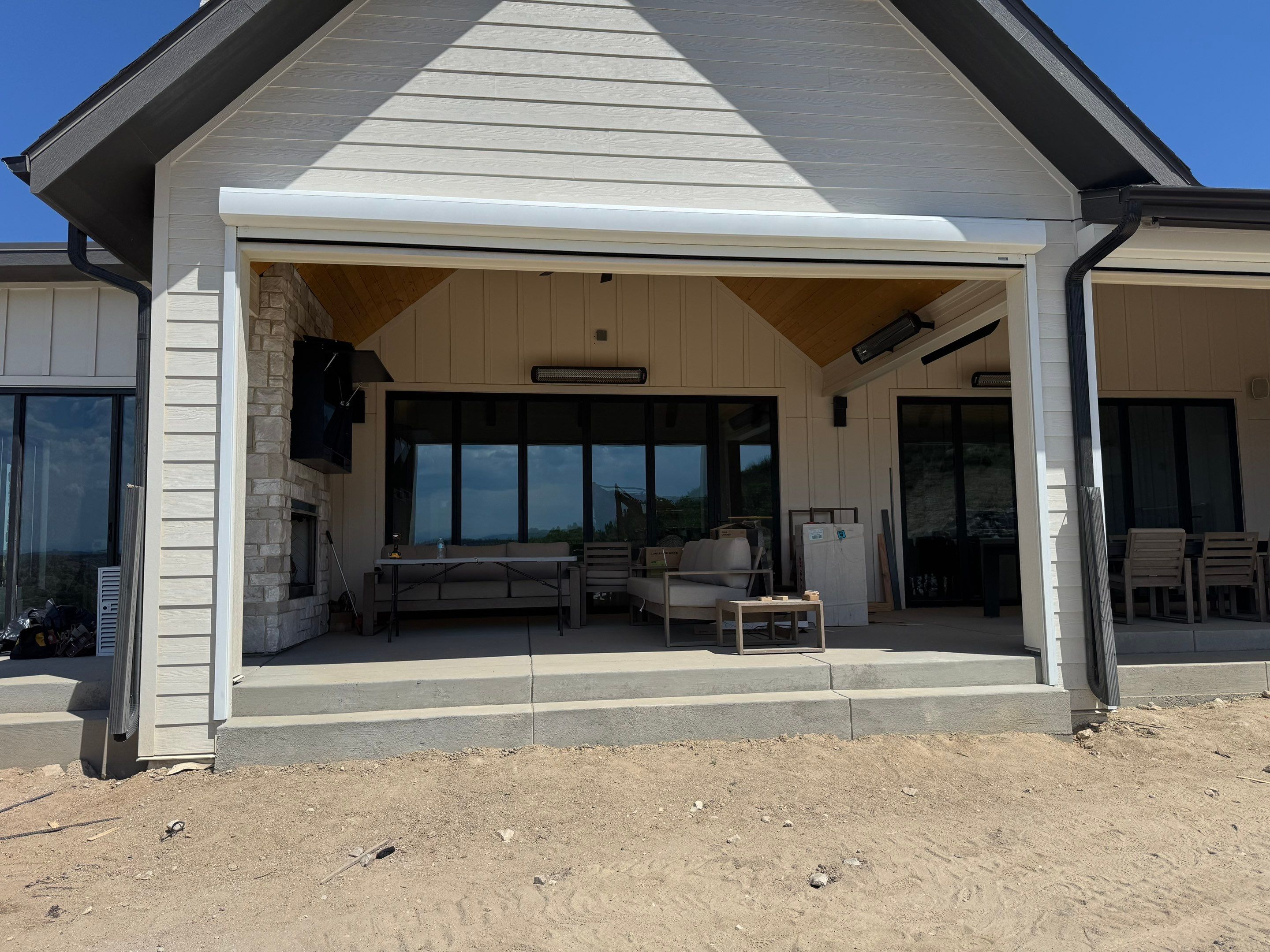 Custom Exterior MagnaTrack Screens for Modern Farmhouse Patio in Castle Rock by Outdoor Solutions Colorado