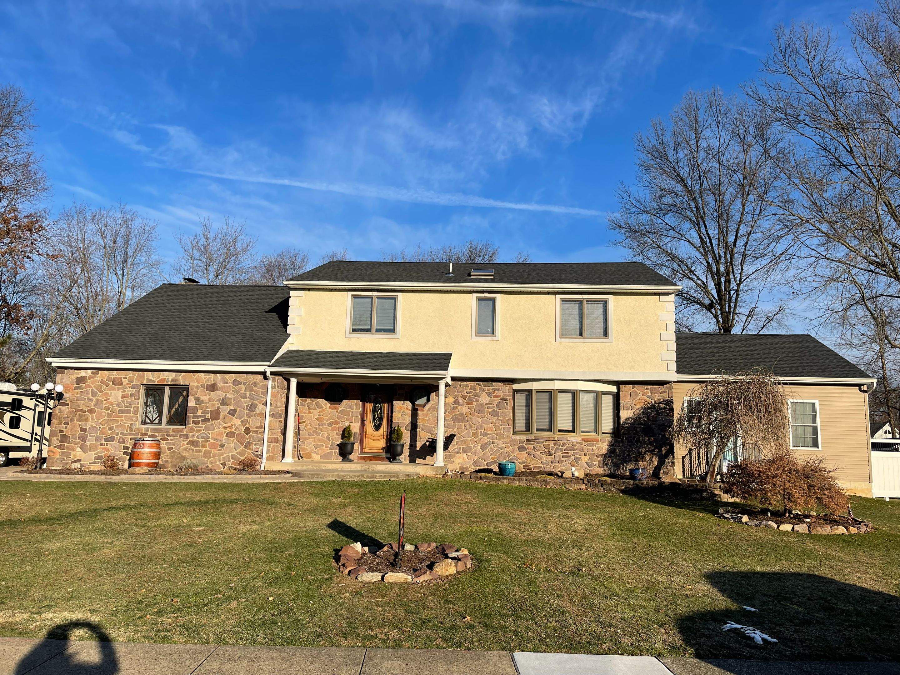 New Architectural Shingle Roof and Gutter Guard Installation in Morrisville by Stofan Construction LLC