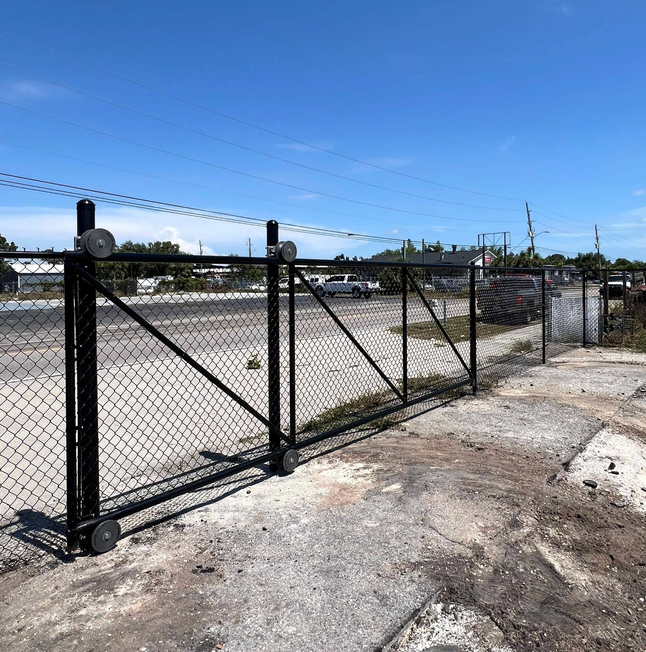 Chain-link Fence Installation using 6ft Black Chain Link Fence  by Asap fence and gates, LLC