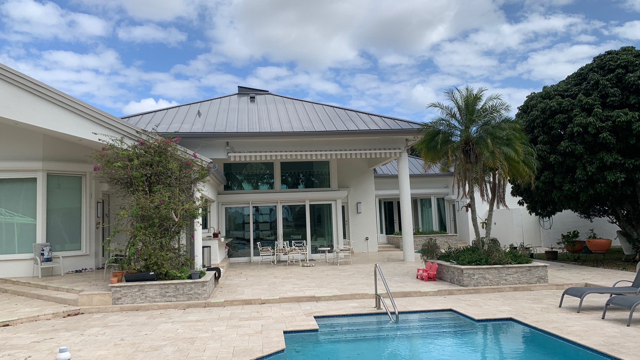 Residential Roofing Installation using 1" Nail strip metal roof by BLUES BROTHERS ROOFING