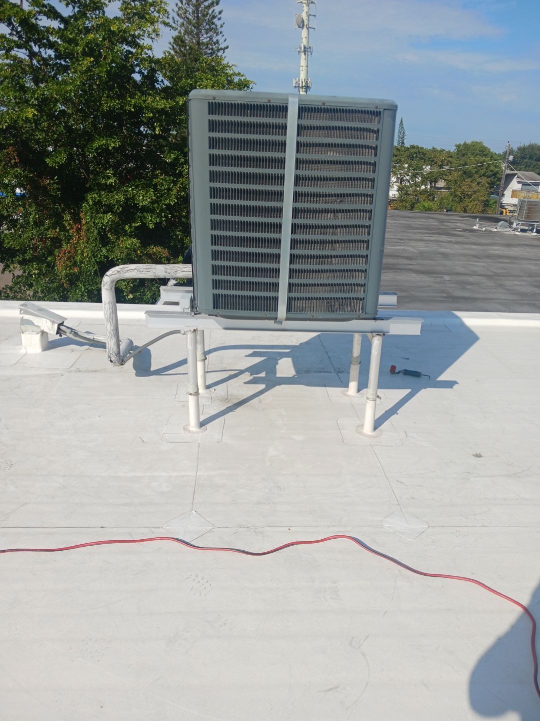 Commercial TPO Flat Roof Installation for Doral Industrial Building by AJF ROOFING INC