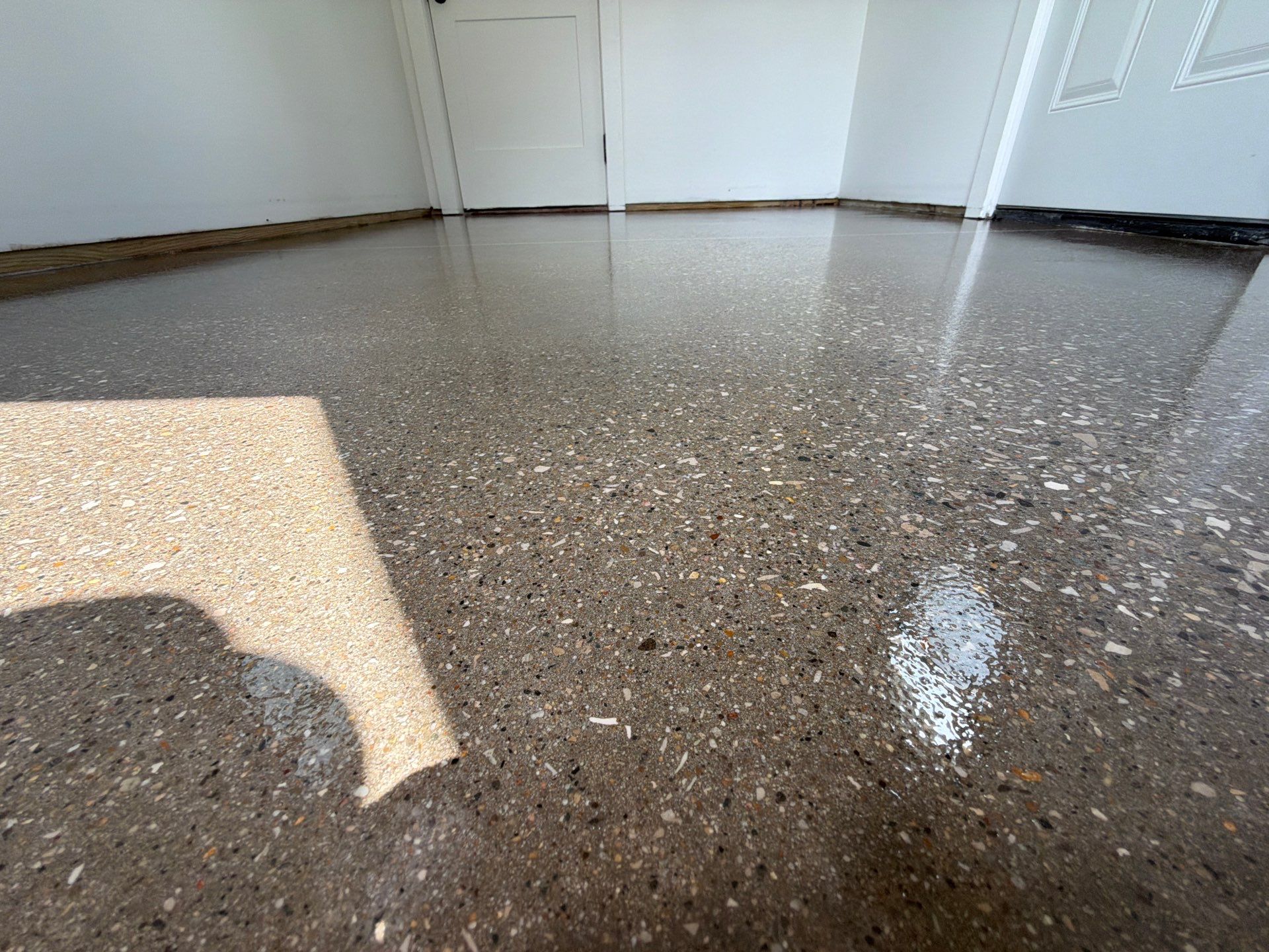 Speckled Epoxy Floor Installation and Concrete Refinishing in Nunica by Gordon Painting