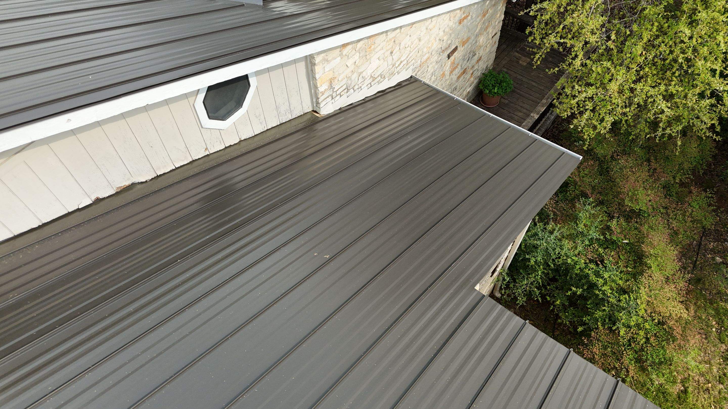 Dark Bronze - L&A Standing Seam with Striations by RoofsOnly.com