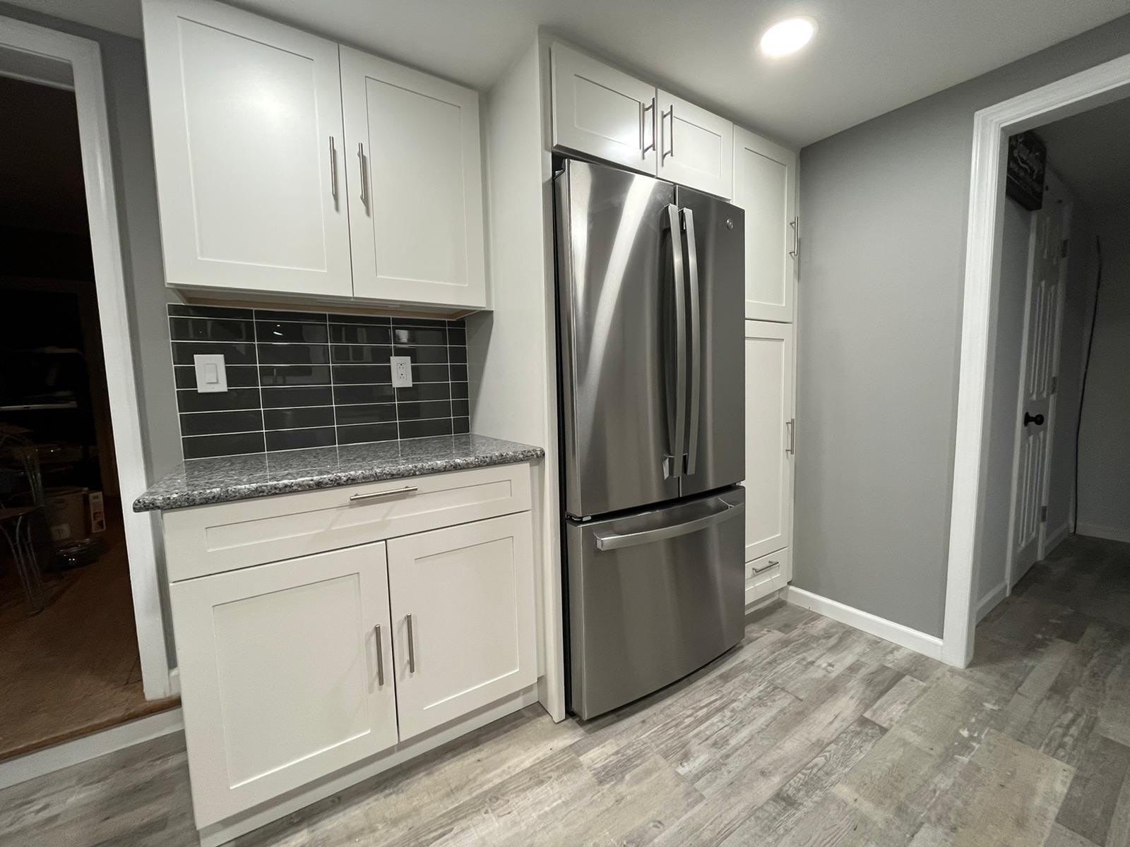 Kitchen Remodel using White Shaker by Home Concepts Construction
