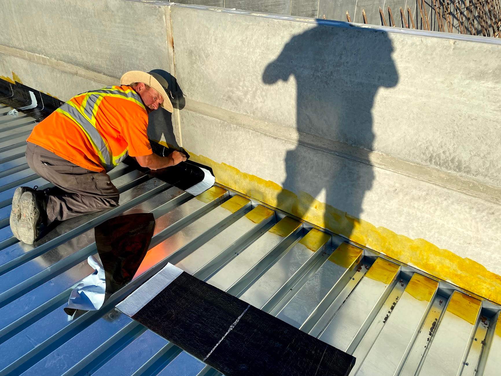 Commercial Roofing Installation using Durolast by Top Notch Roofing Inc