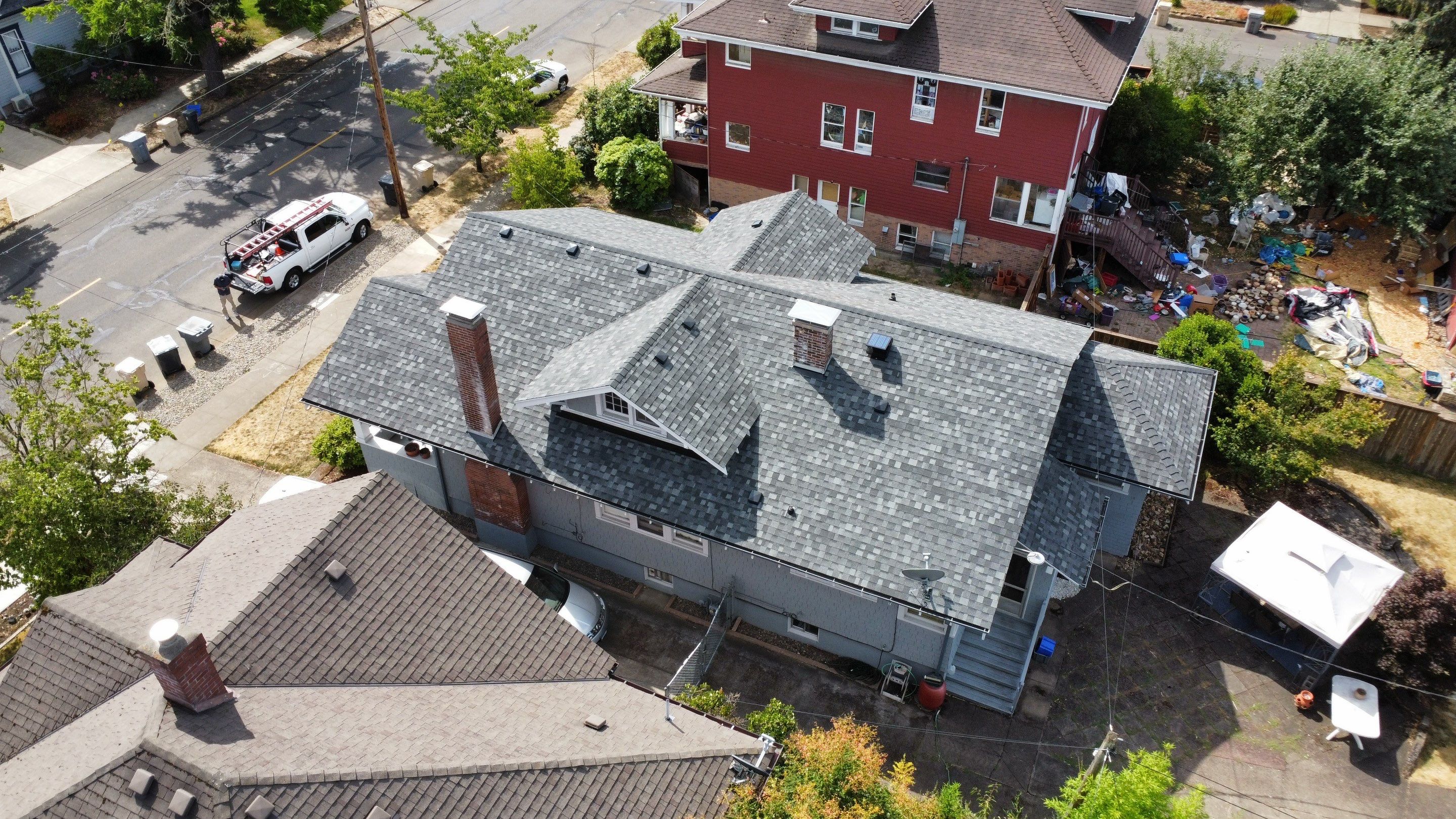 Residential Roofing Installation using IKO Dynasty (Color: Summit Grey) by Orezona Building & Roofing Company, Inc.