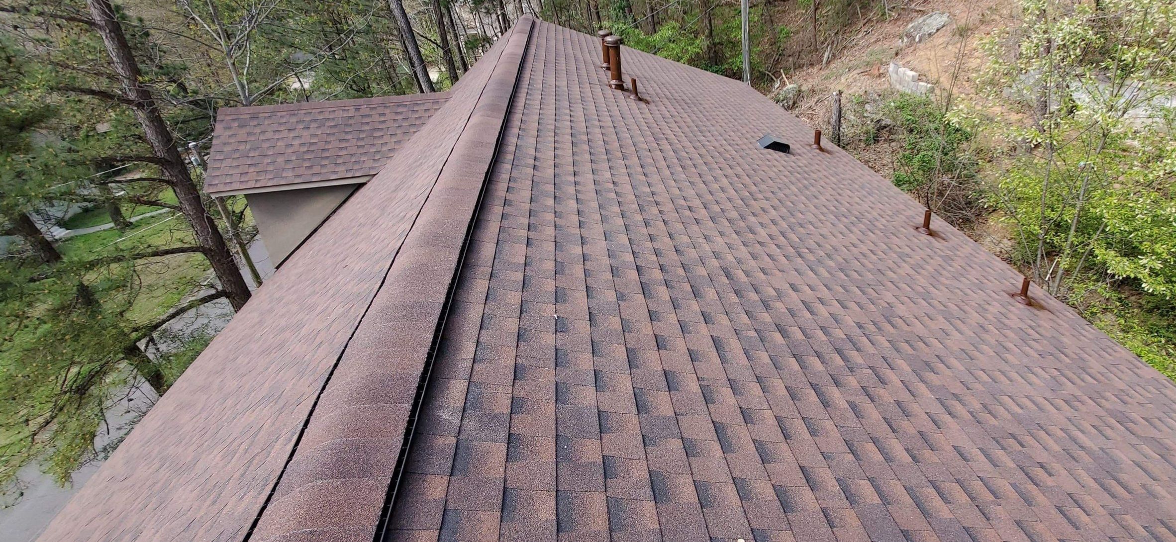 Residential Roofing Installation using Architectural Shingles by The Roofing Dudes