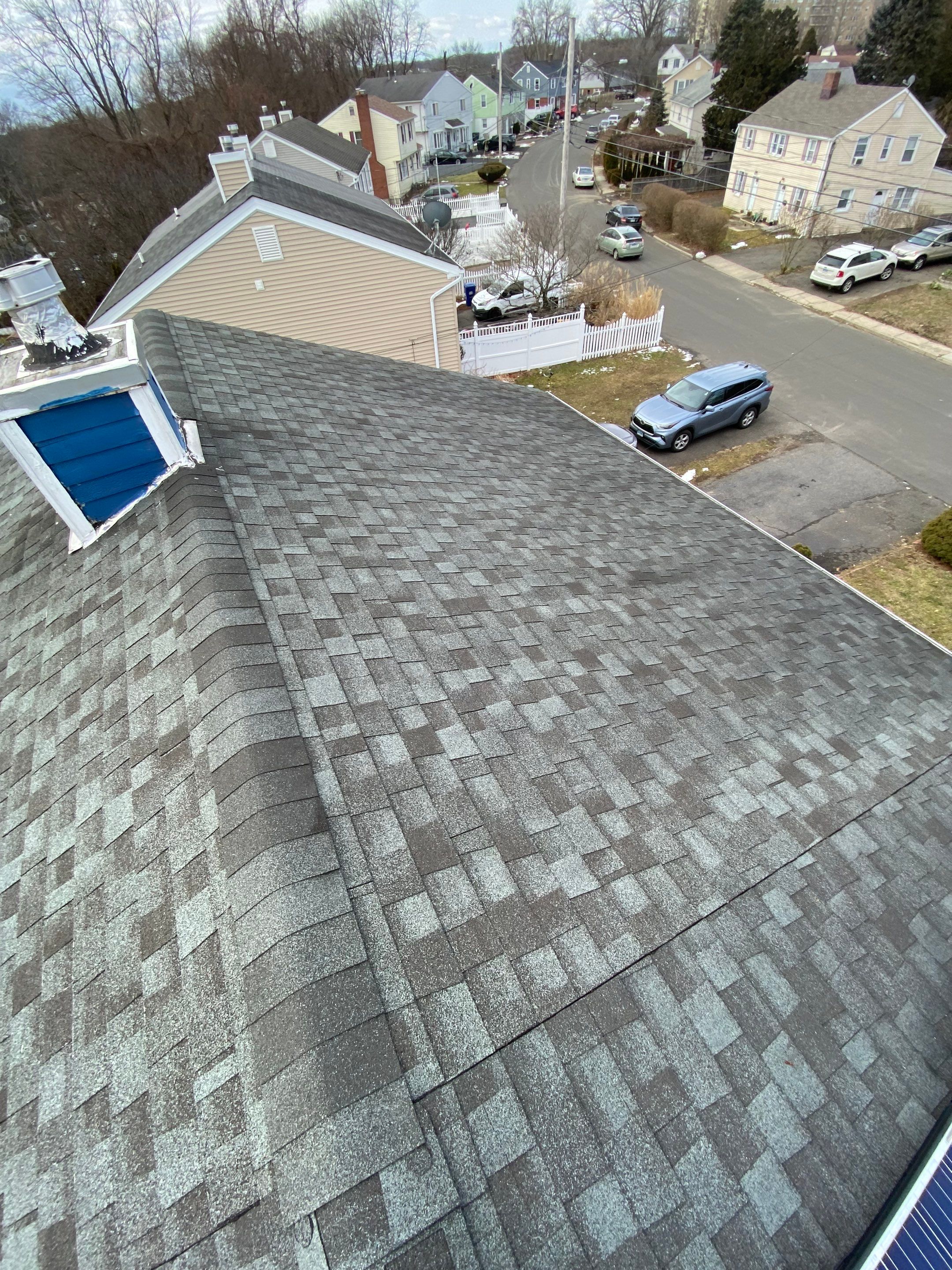 Harbor Blue Shingles by Reimagine Roofing