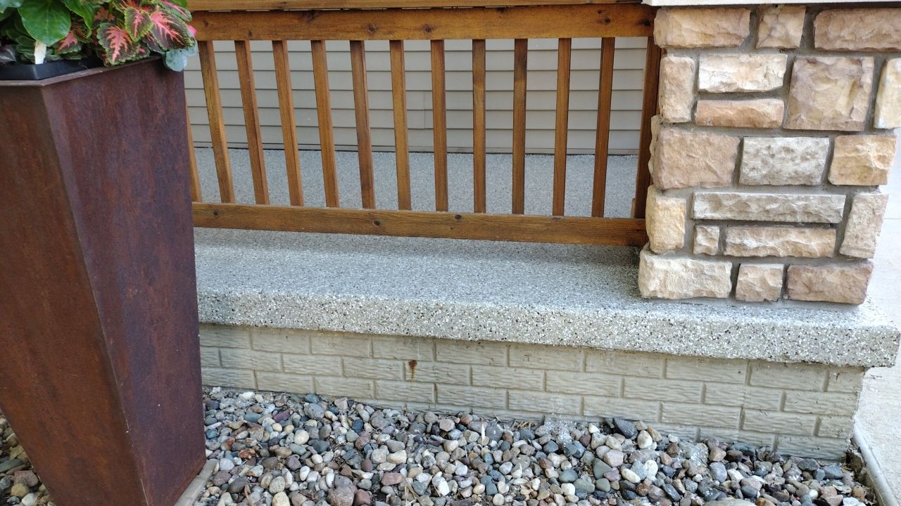 Pebble Beach Front Porch by Revival Concrete Coatings, LLC