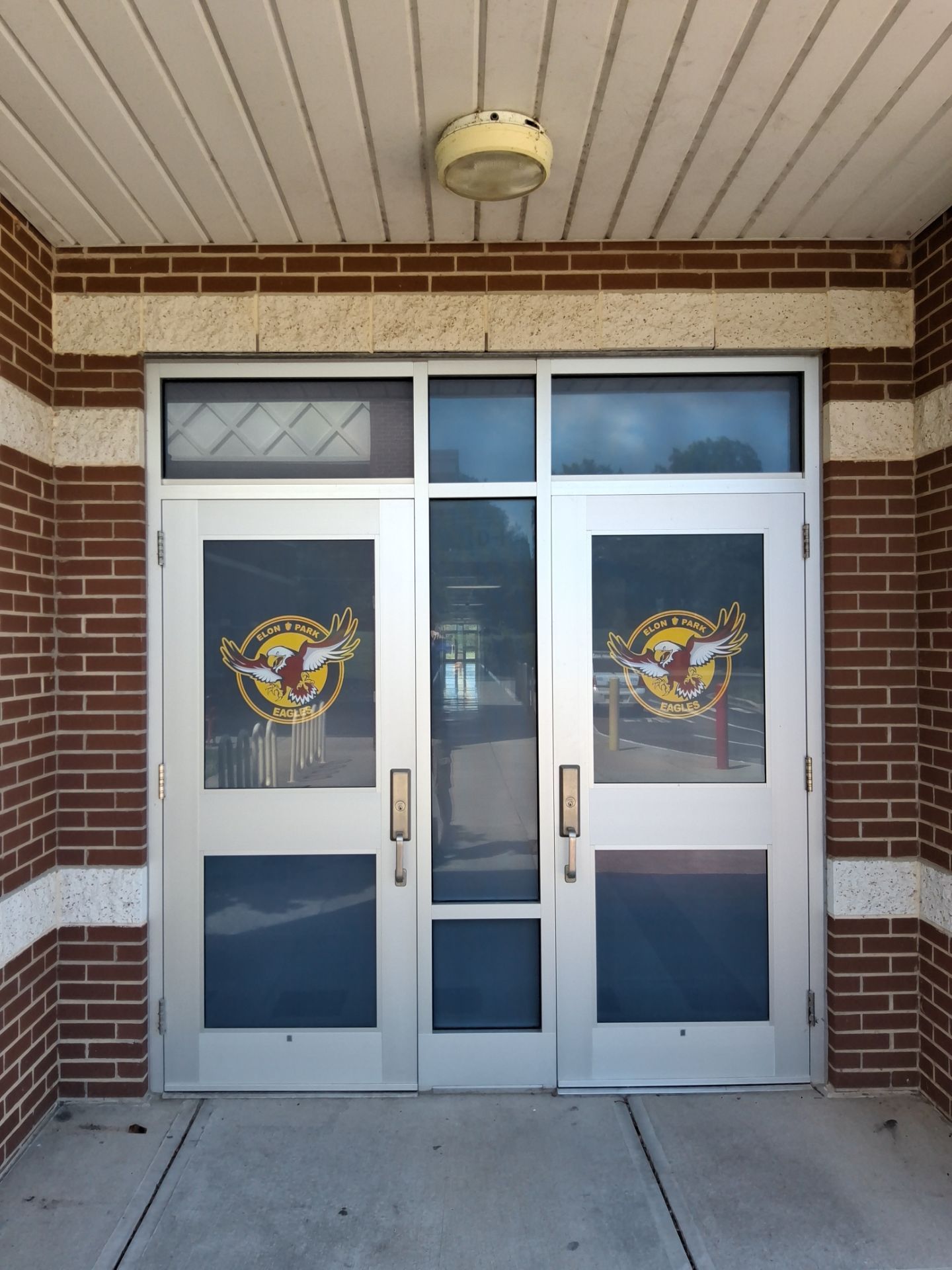 Elon Park Elementary - Window Safety Film Installation with Custom Graphics by QC Signs and Graphics